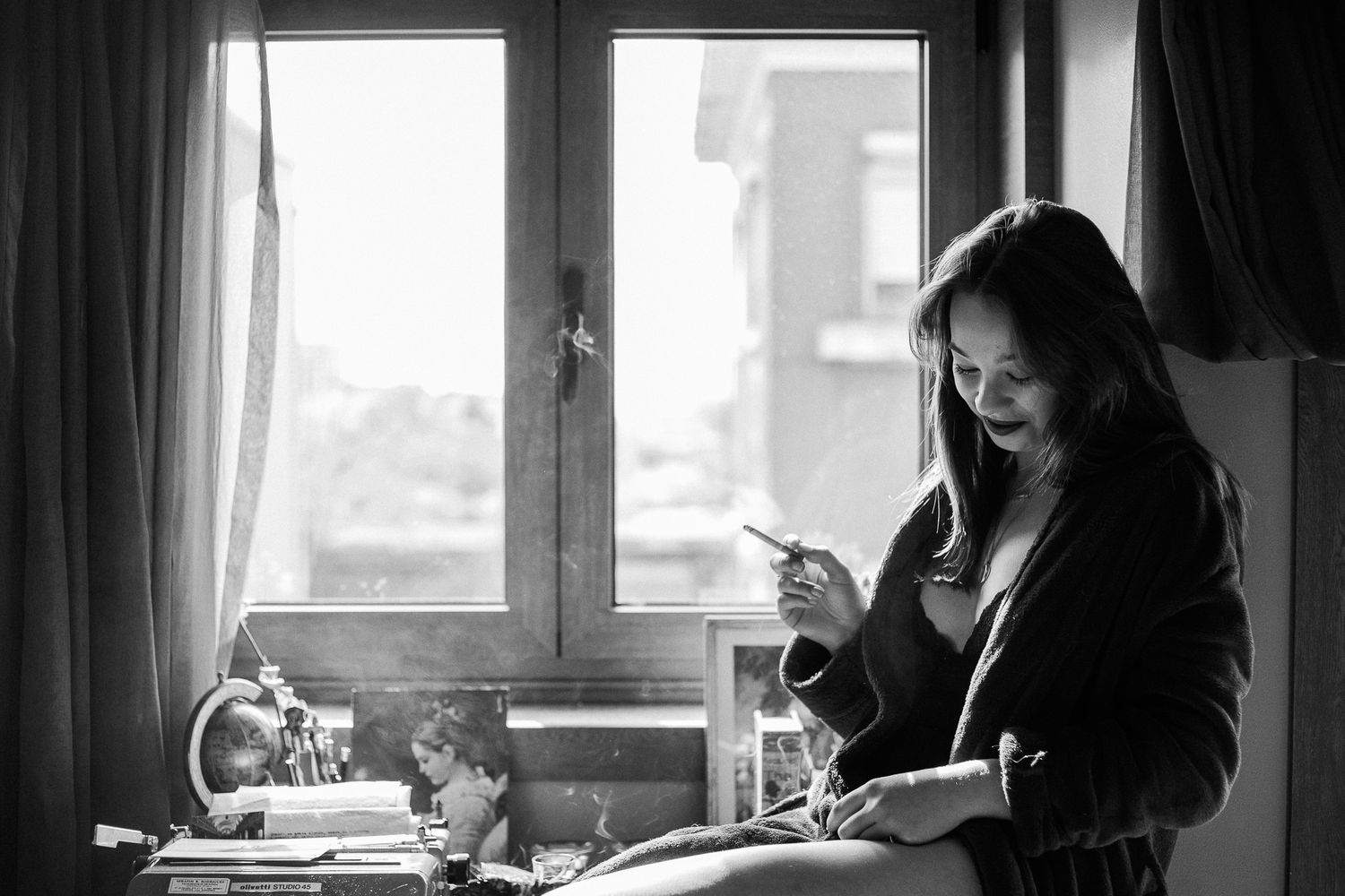 Black and white photo sequence by a window showing silhouettes and natural lighting.