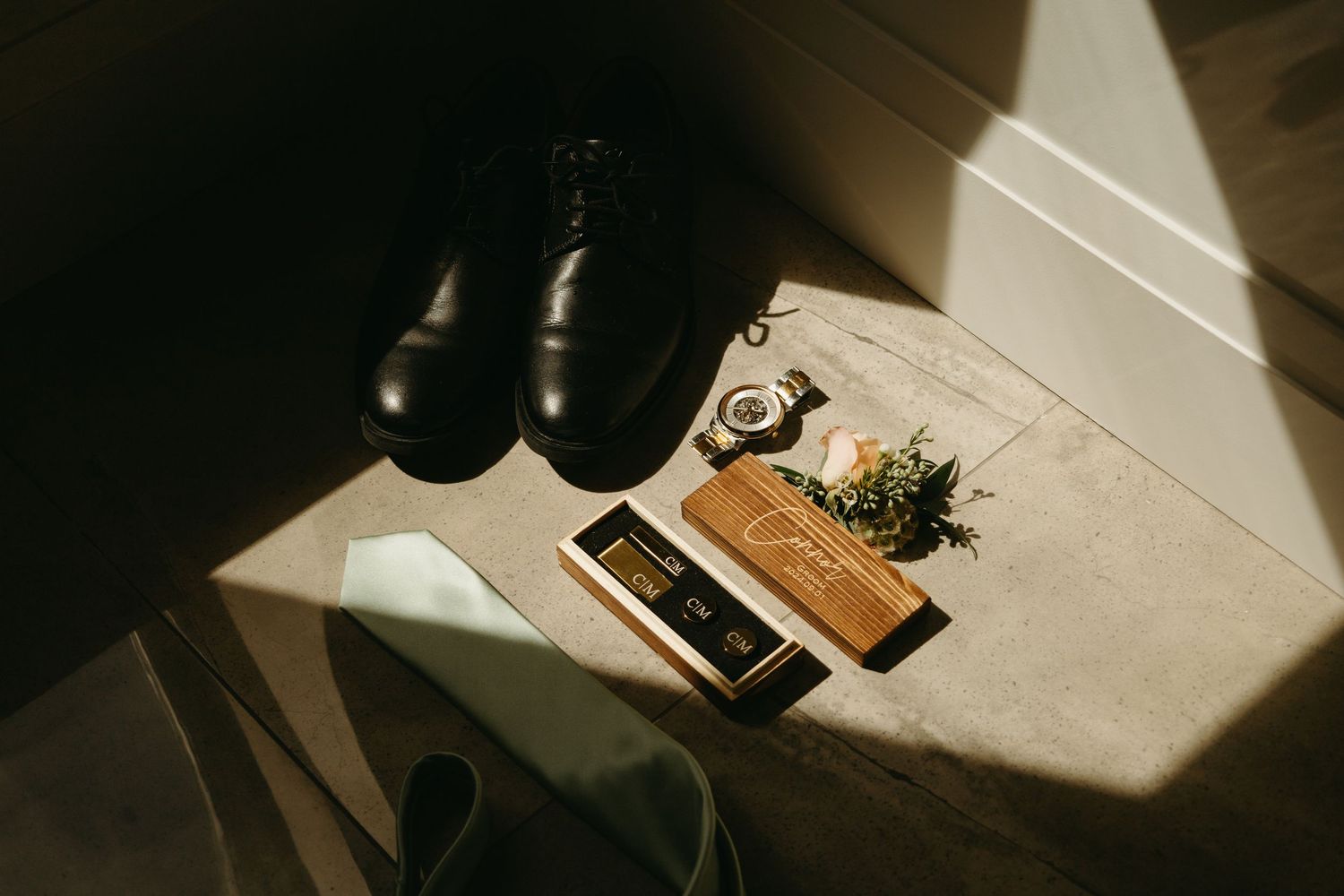 A series of minimalist interior shots showing sunlight casting shadows on walls and furniture in a modern home setting.