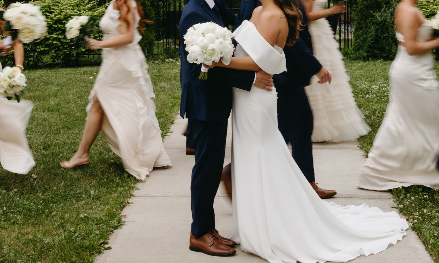 A series of candid wedding photos showing couples embracing outdoors in a garden setting.