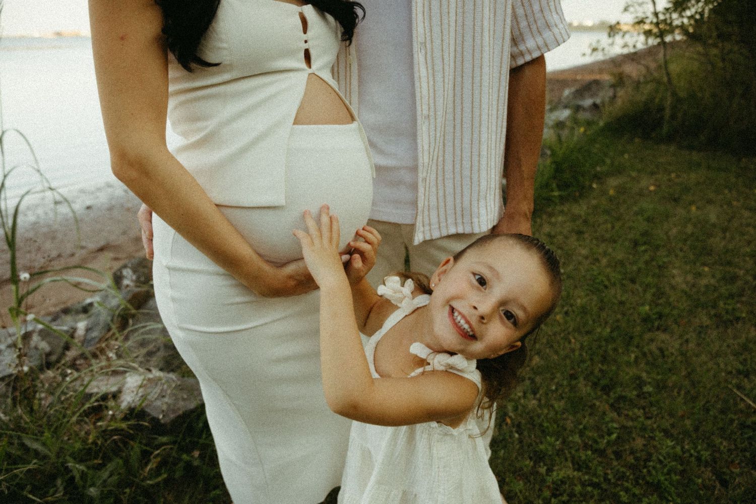 A collection of romantic moments showing a couple in white outfits embracing and posing together in various intimate poses.