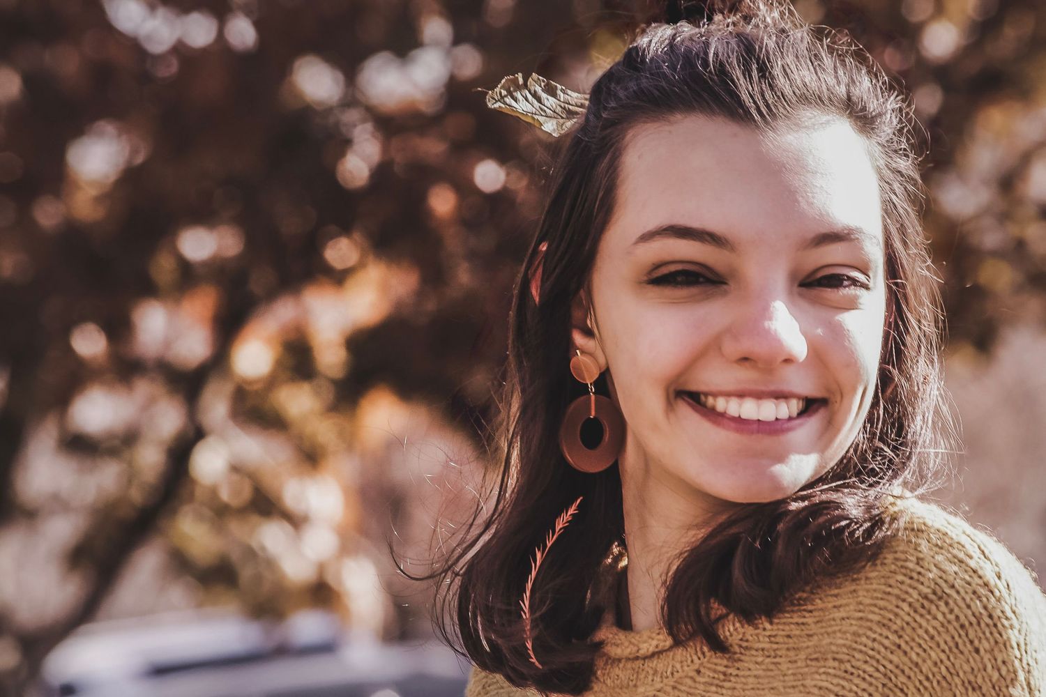 Outdoor portrait in the woods capturing candid emotions and smiles