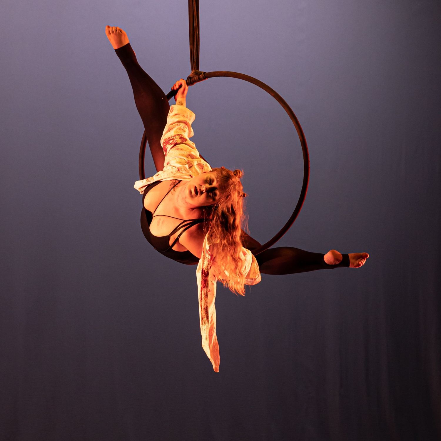 Aerial performance on the Lyra by Shay Godfrey, inclusive photographer and performer in Colorado