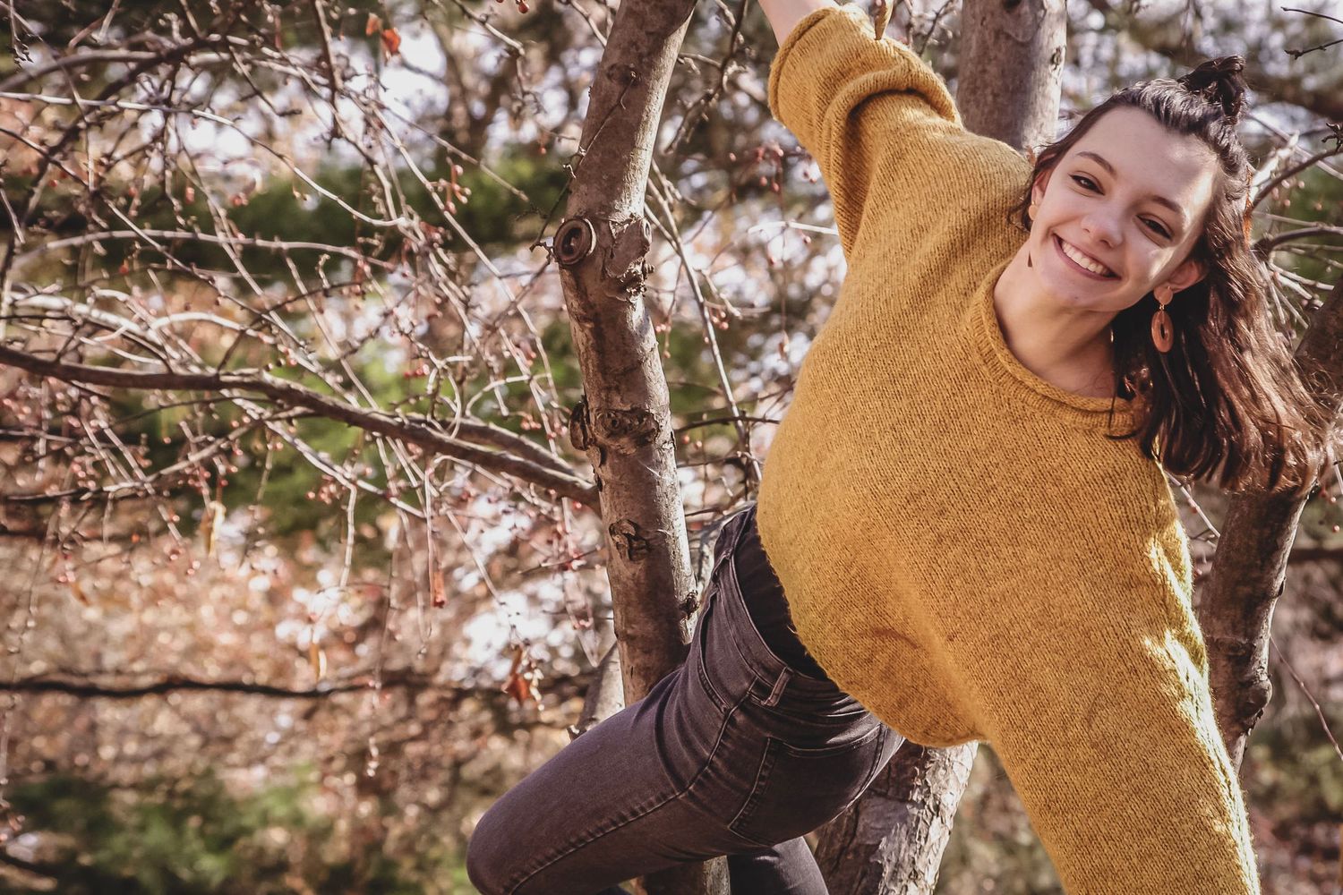 Outdoor portrait in the woods capturing candid emotions and smiles