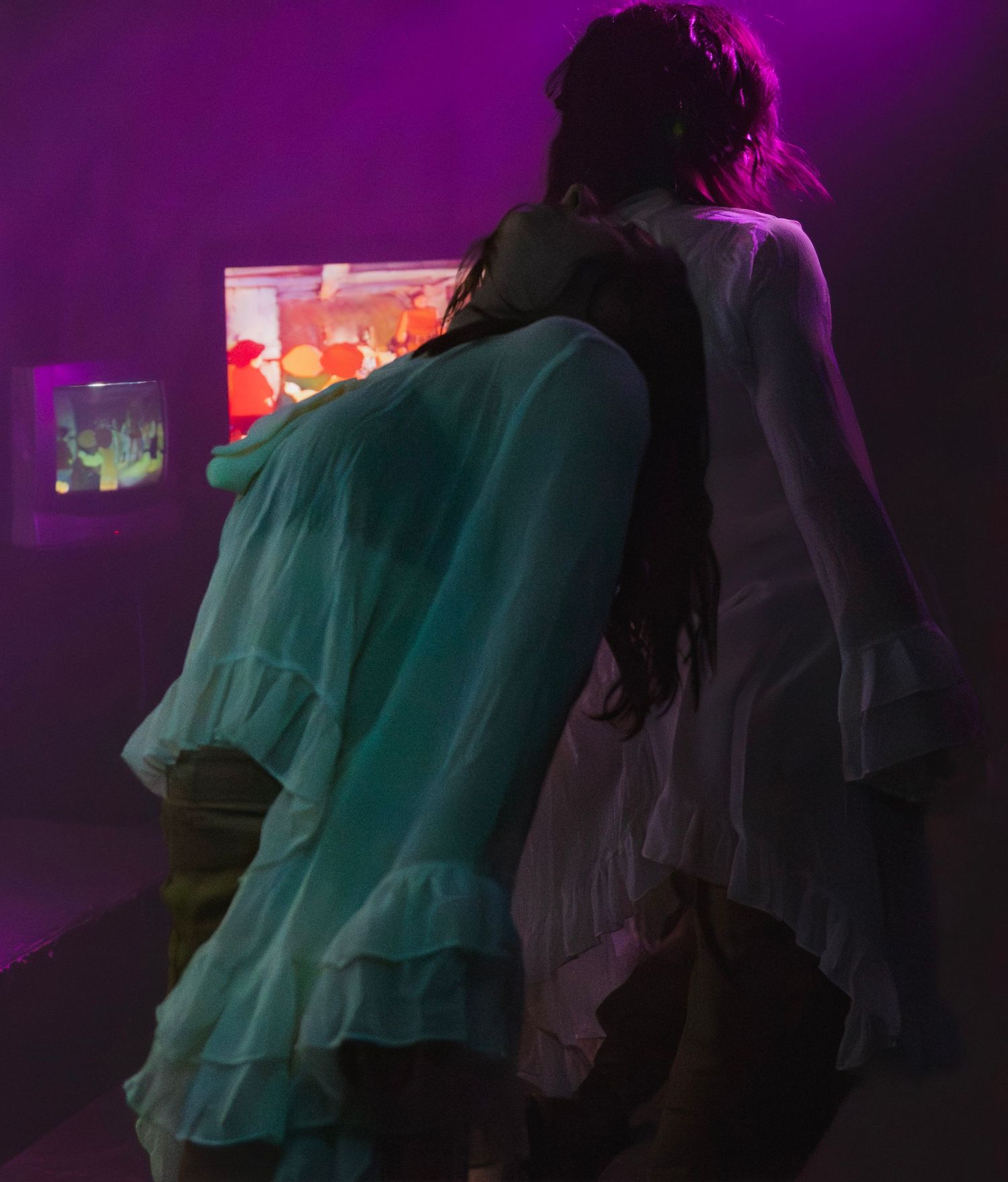 Performers dancing during moonshake concert at bar 404