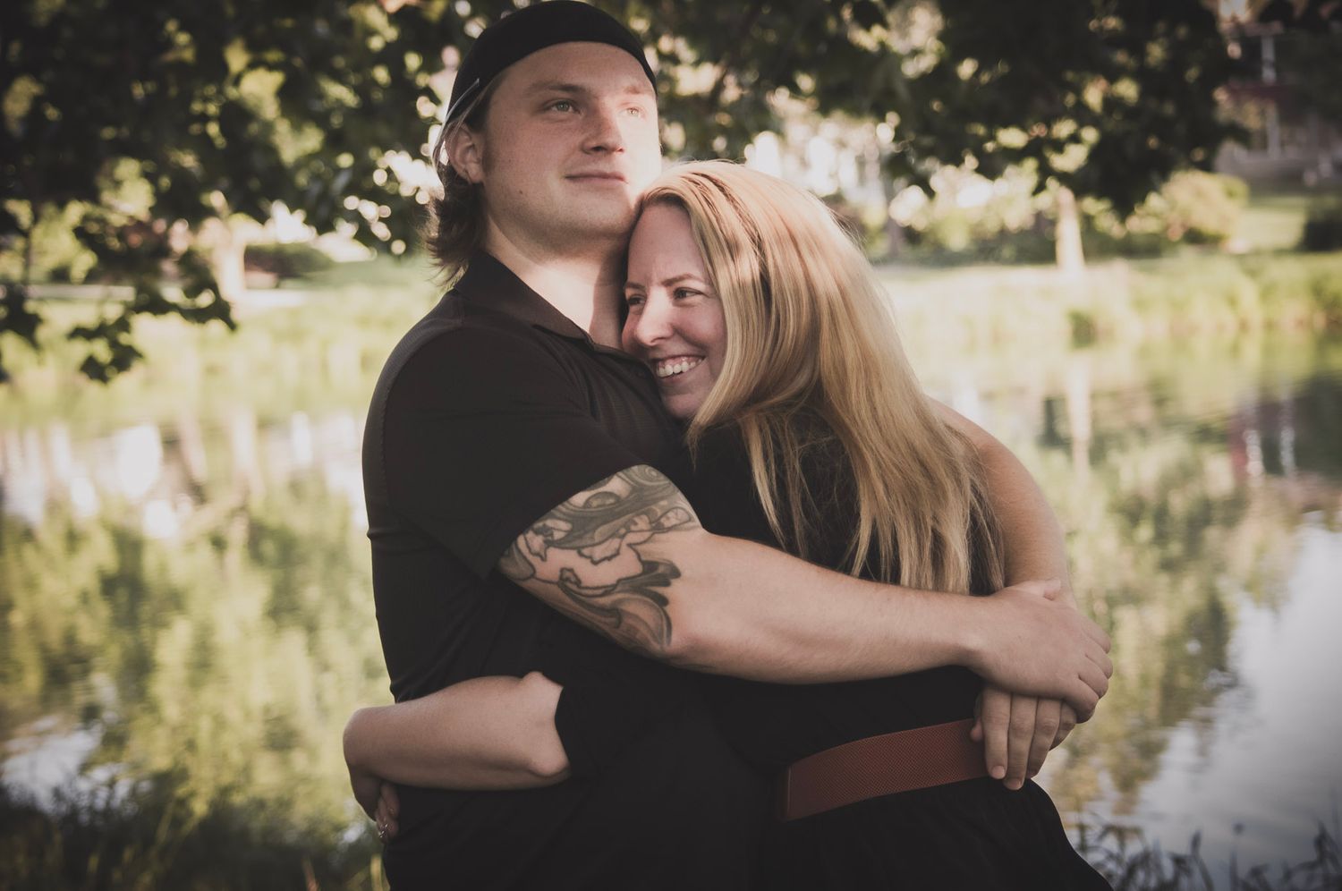 Romantic lifestyle photography of a couple hugging outdoors in Colorado