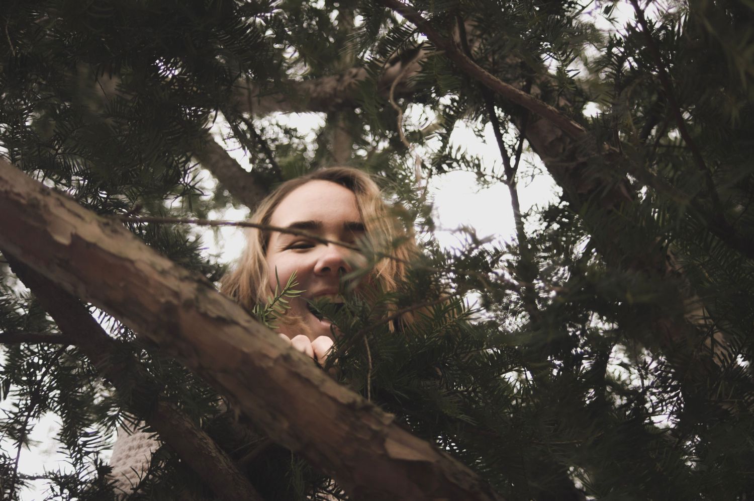 Outdoor portrait in the woods capturing candid emotions and smiles