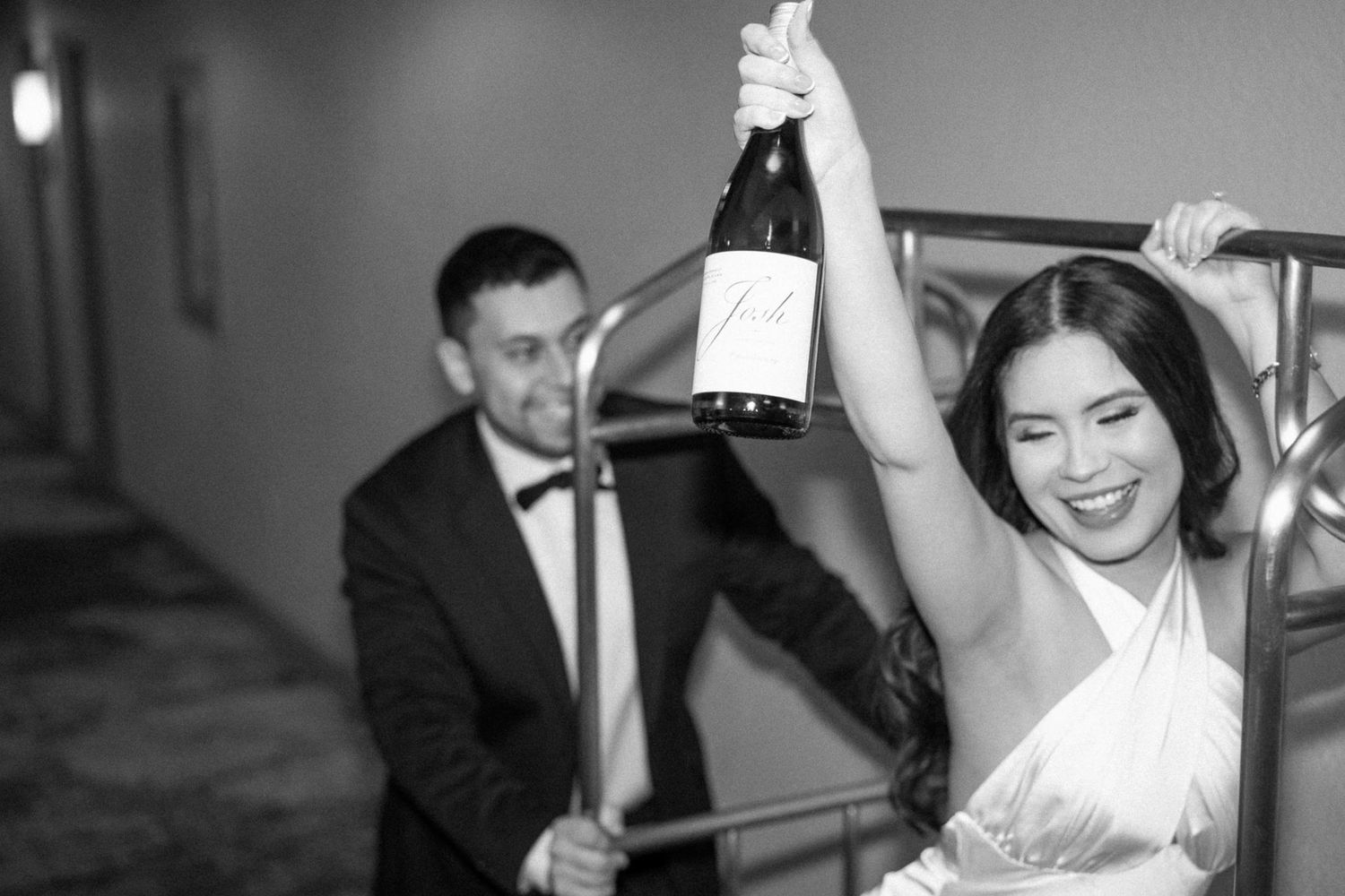 Candid celebration moments captured in black and white at an event.