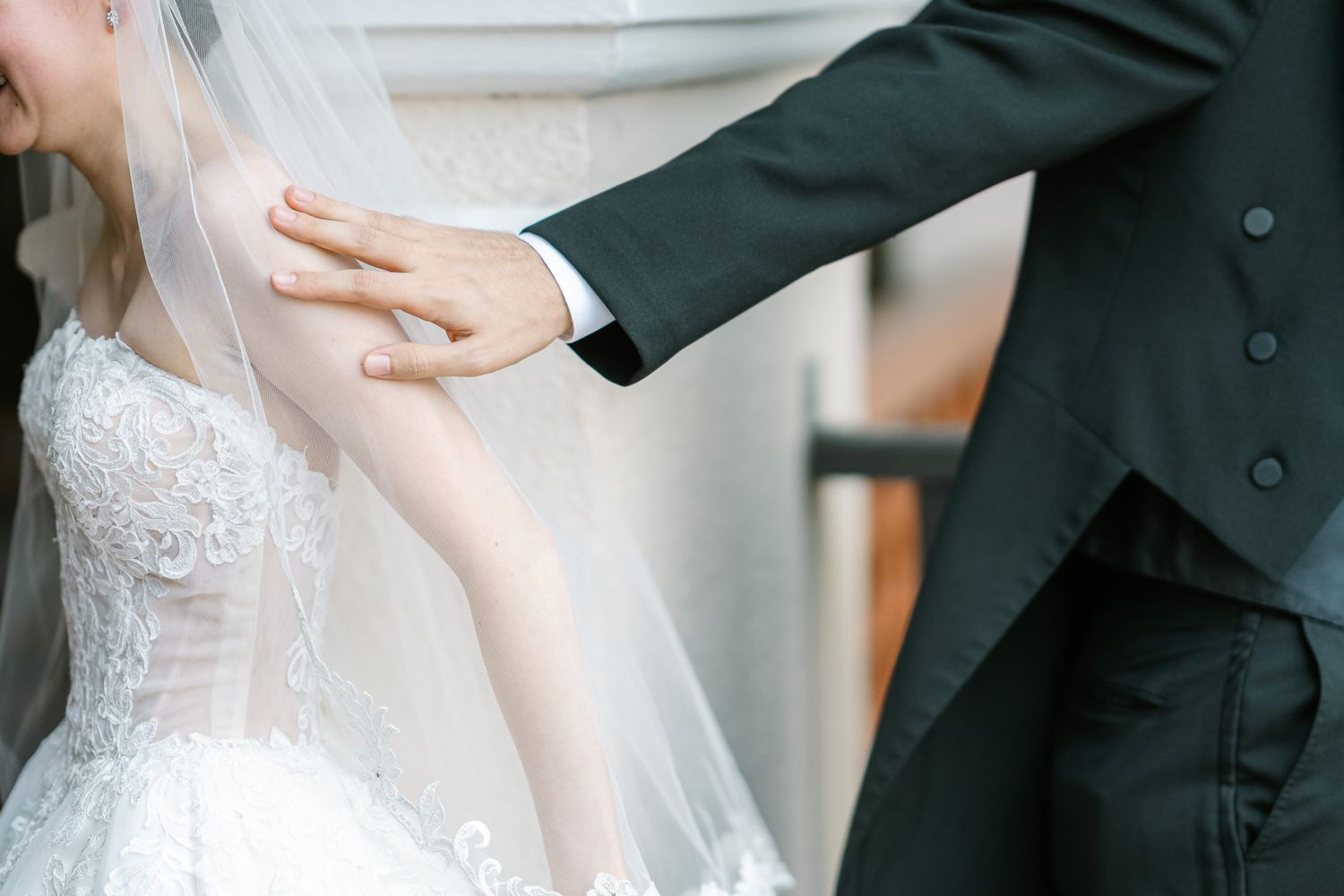 Elegant lace wedding dress details shown in a series of romantic close-up shots.