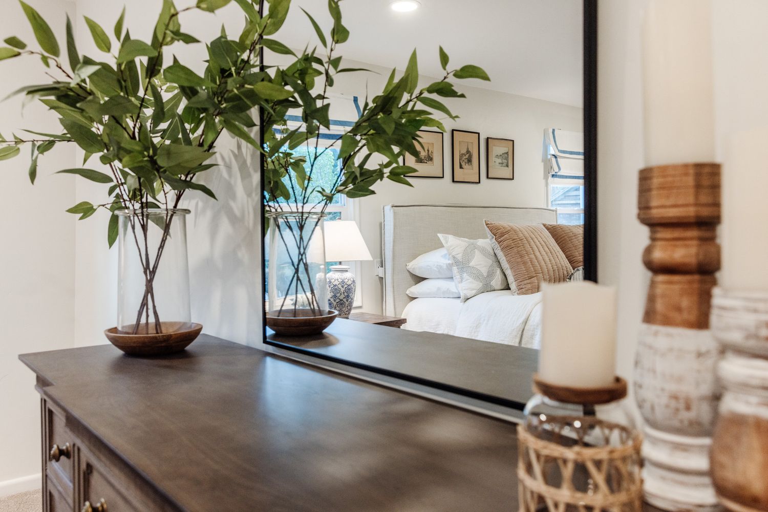 Bright interior space with decorative greenery and modern furnishings.