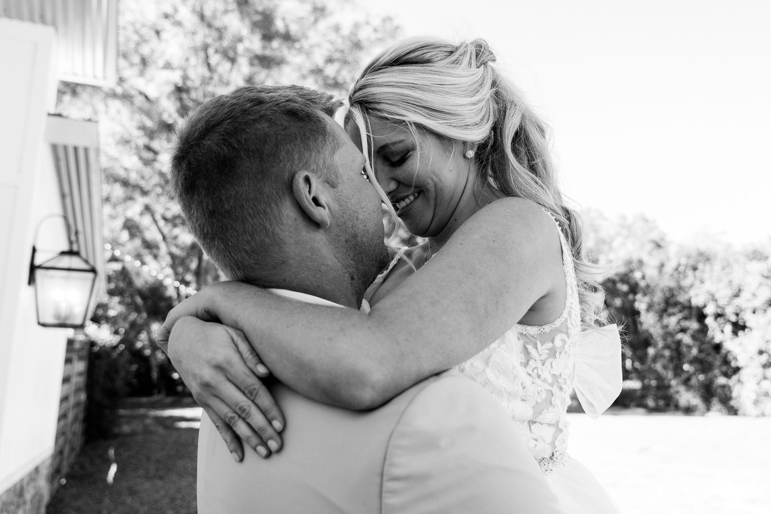 Intimate black and white wedding portraits showing tender moments.