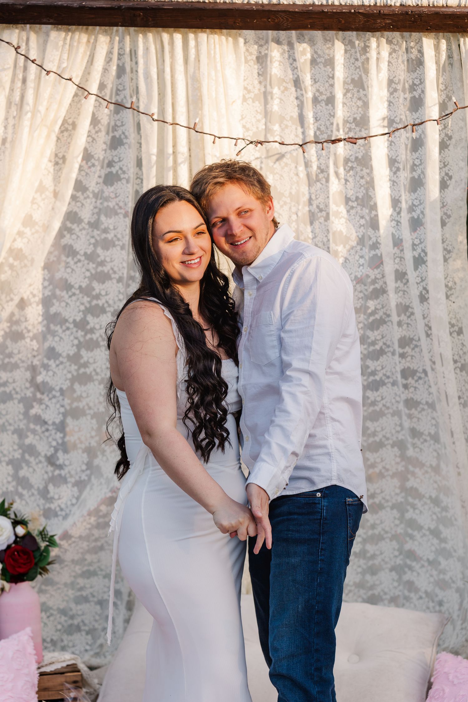 A couple shares tender moments in front of white lace curtains in a romantic photo collage.