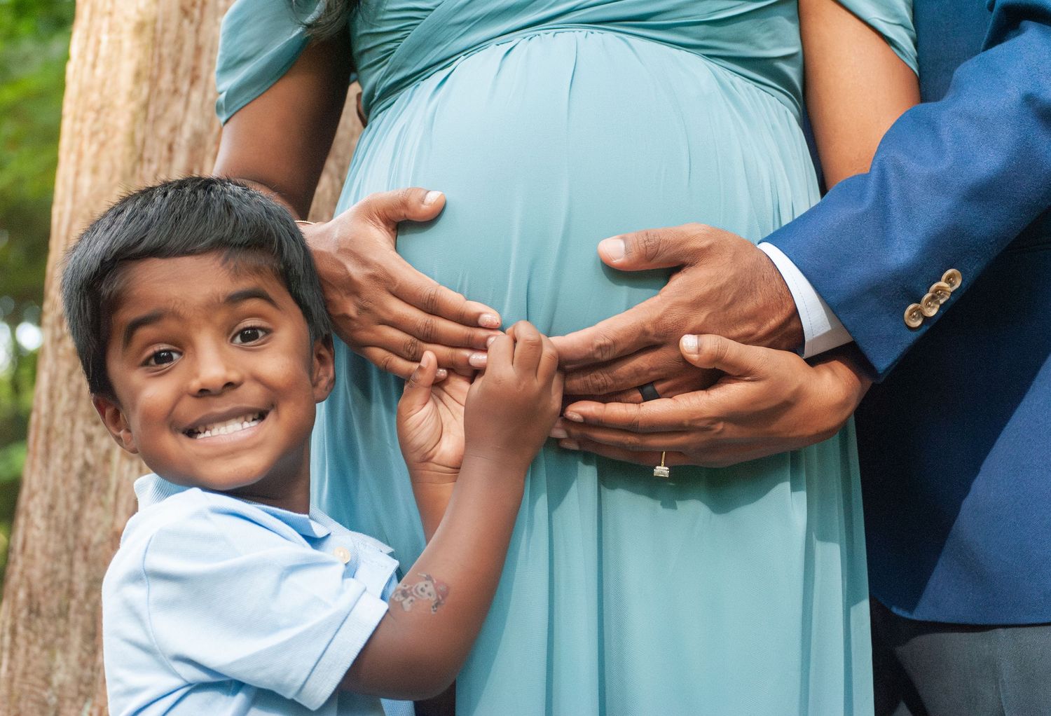 A sweet maternity photo sequence showing tender moments between a parent and child in a light blue dress outdoors.