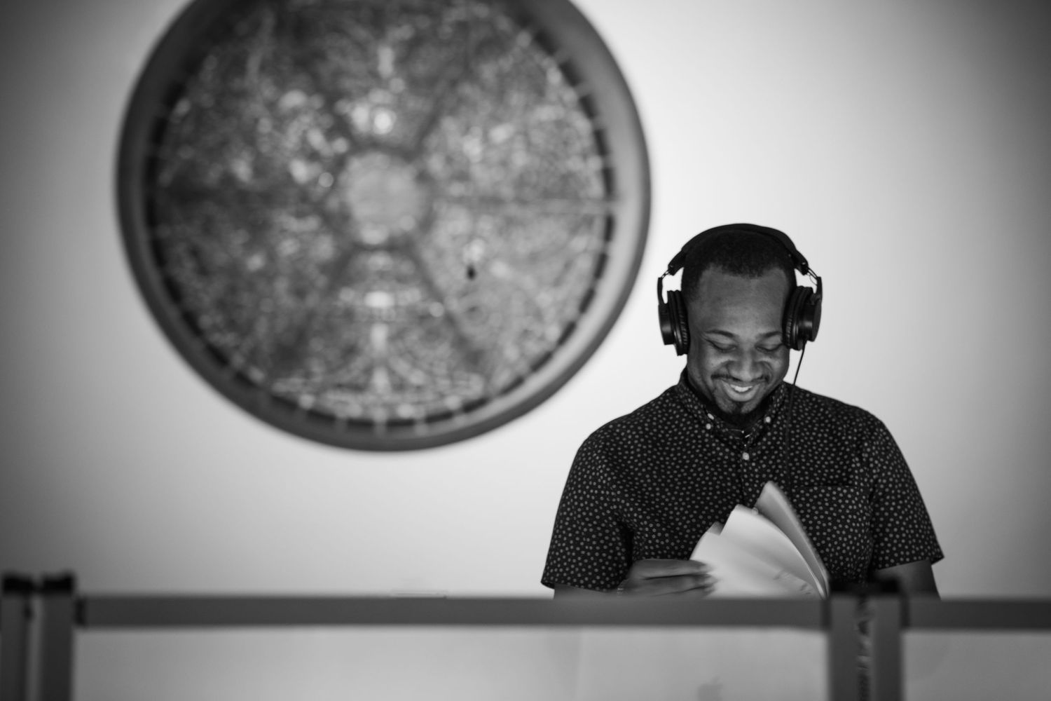A series of black and white photographs showing different emotional expressions and reactions in a portrait style.