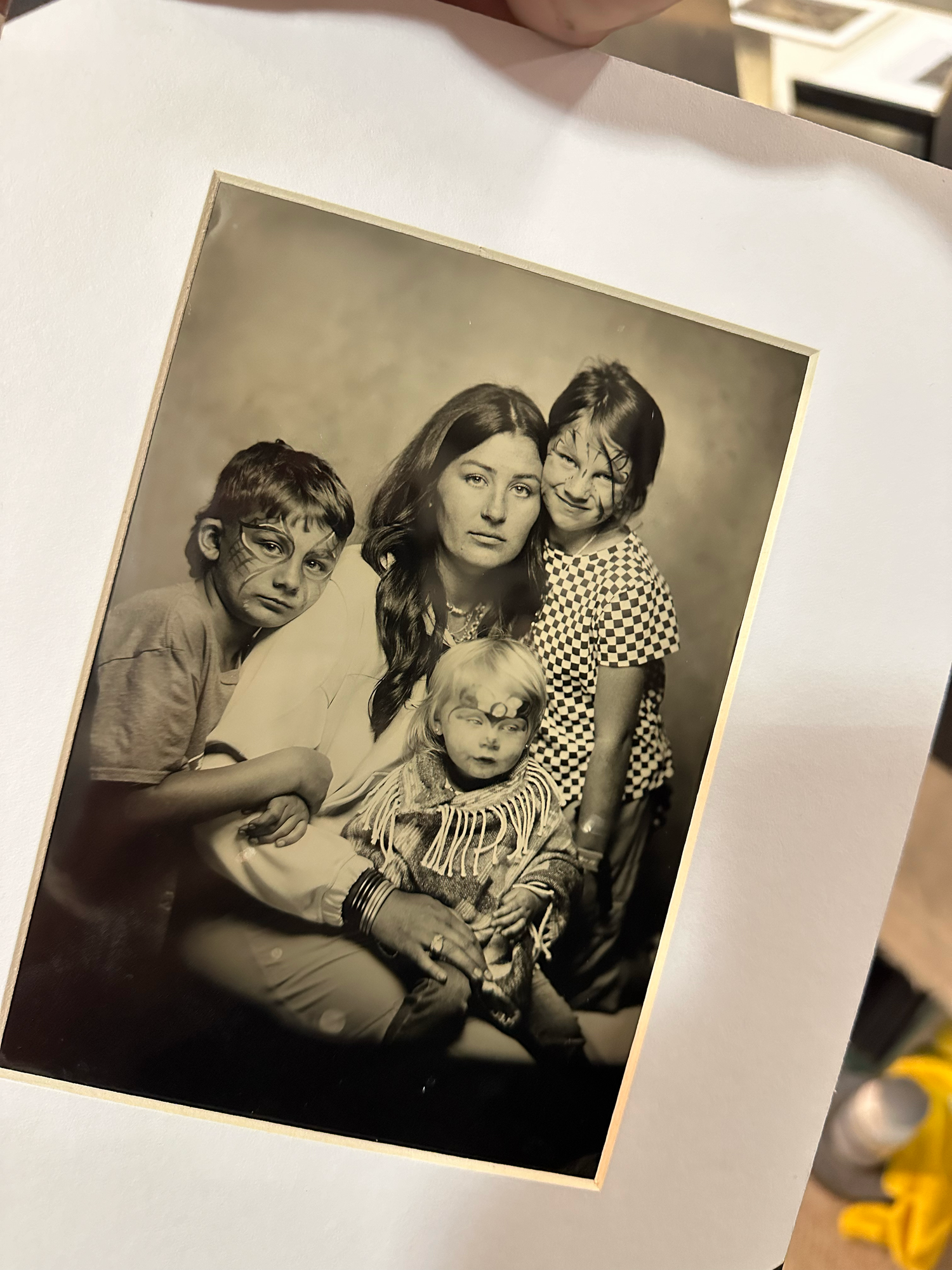 matted 5x7 tintype portrait of a mom with her 3 kids