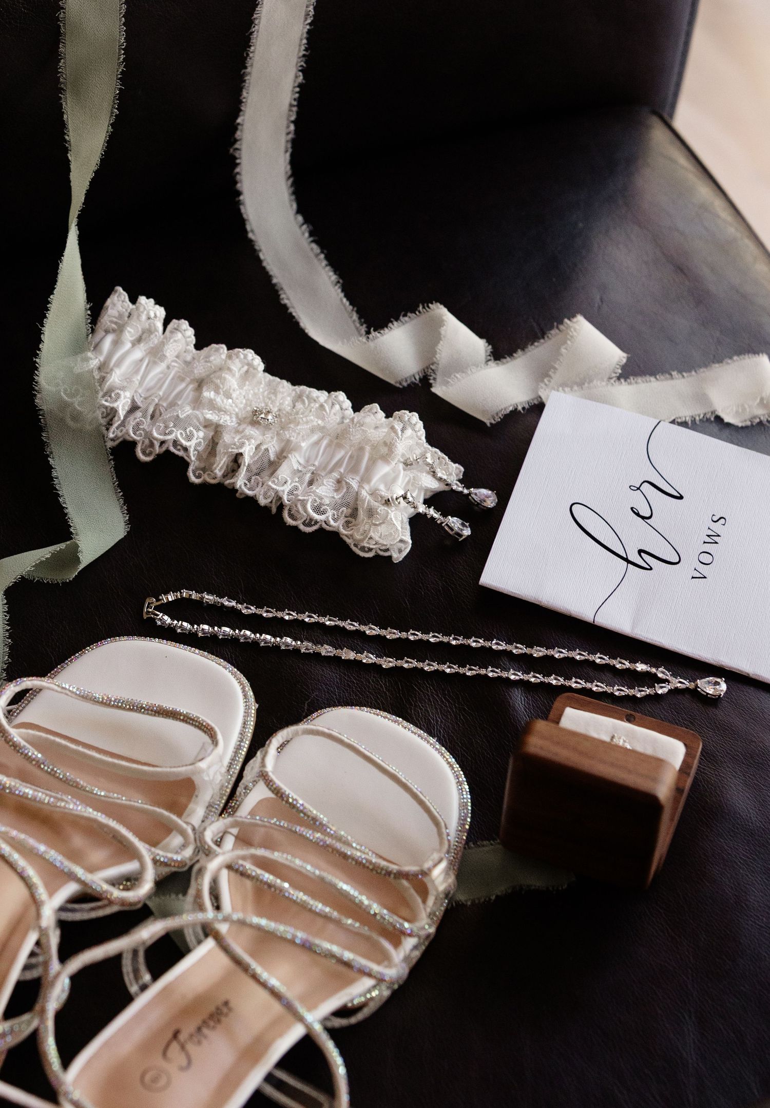 A collection of white bridal shoes and a handwritten veil tag displayed in sequence showing details from different angles.