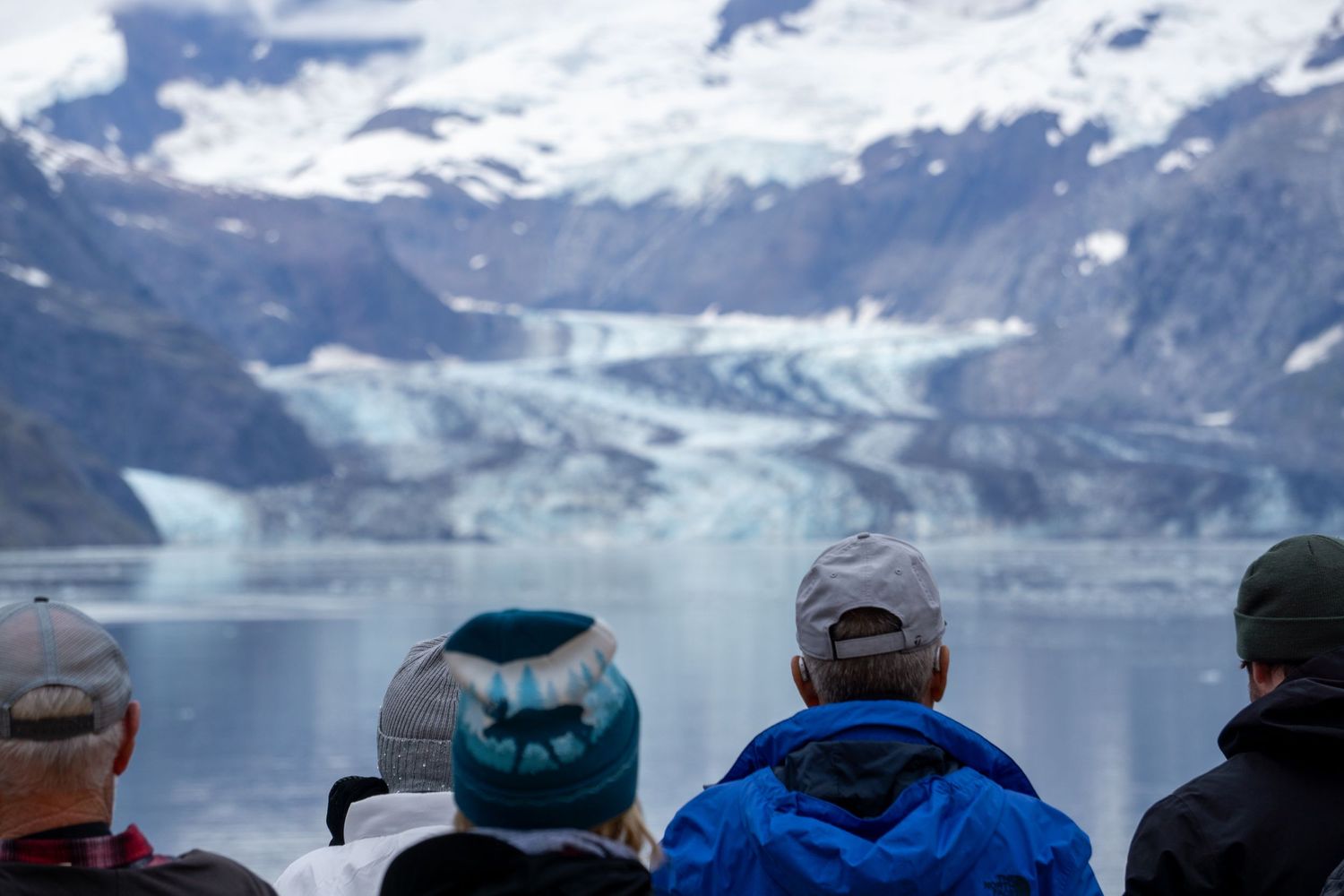 Visitors observe the majestic Margerie Glacier in Glacier Bay National Park from a viewing deck.