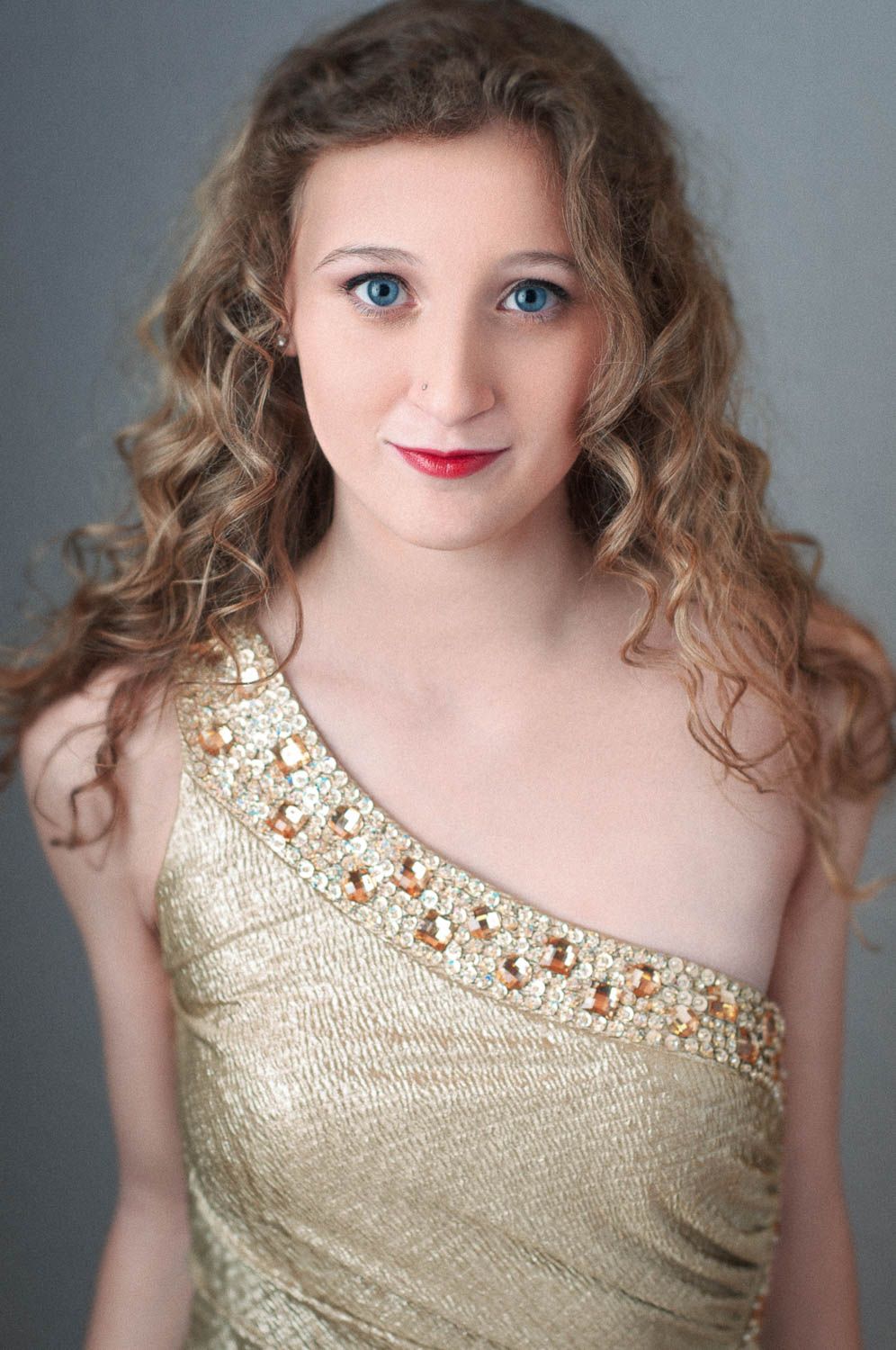 Creative portrait of a young woman with light hair
