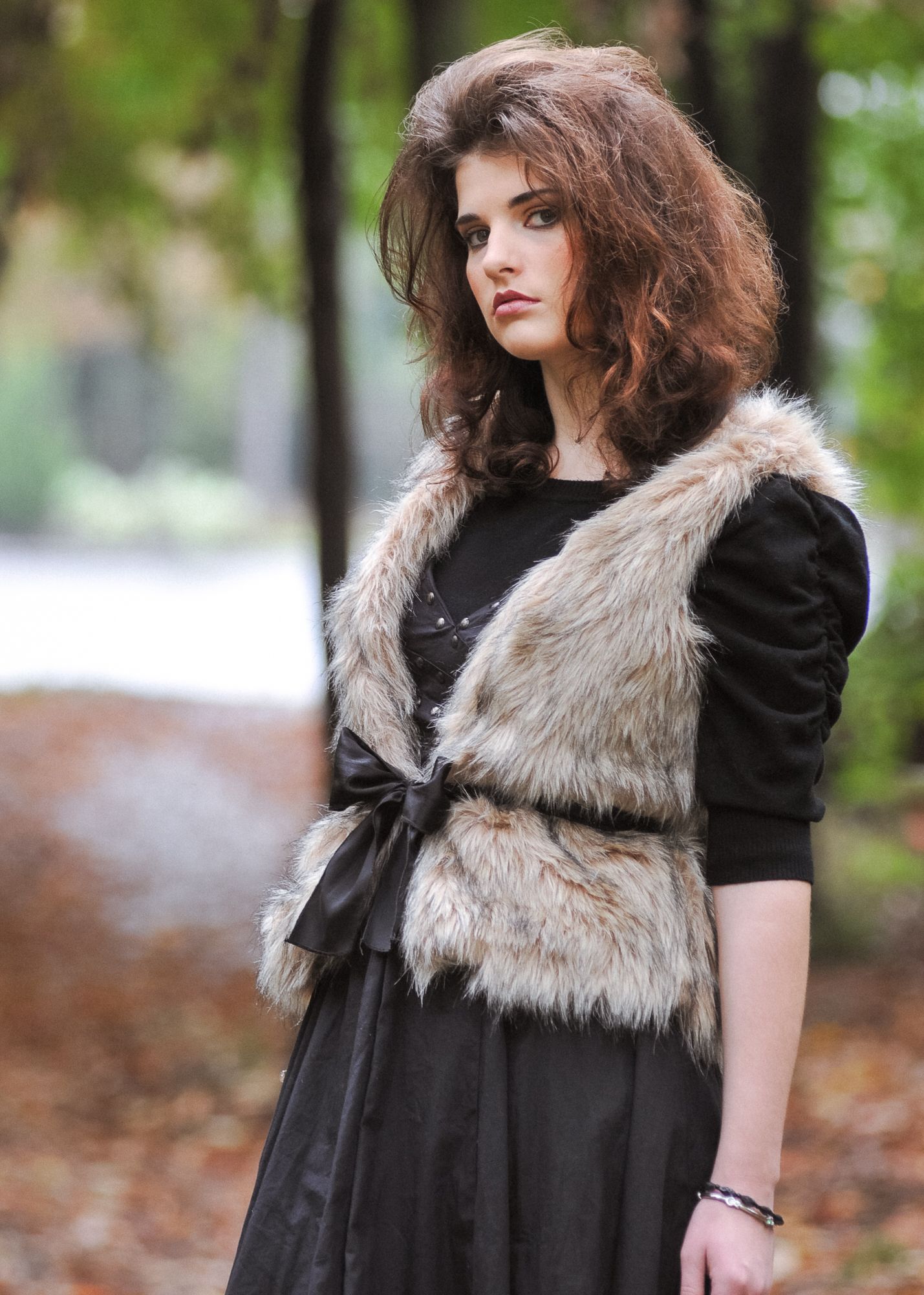 Fashion branding photo for clothing with a young woman outside