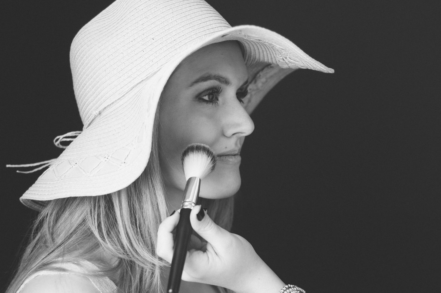BTS at photoshoot with makeup being applied