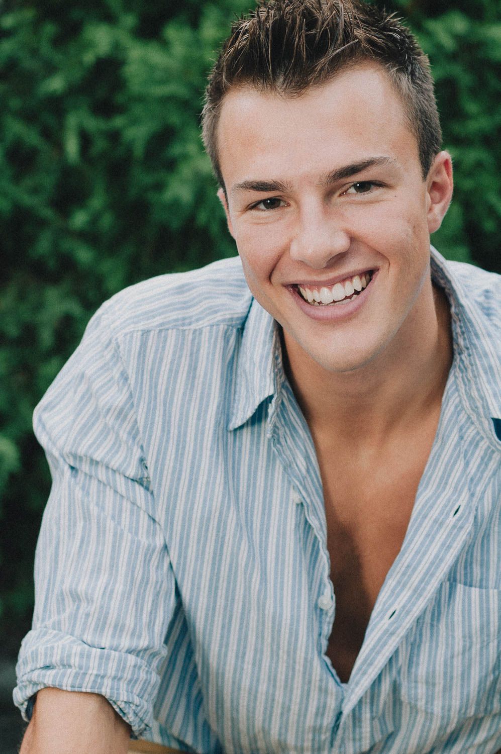 Lifestyle portrait of young man outside