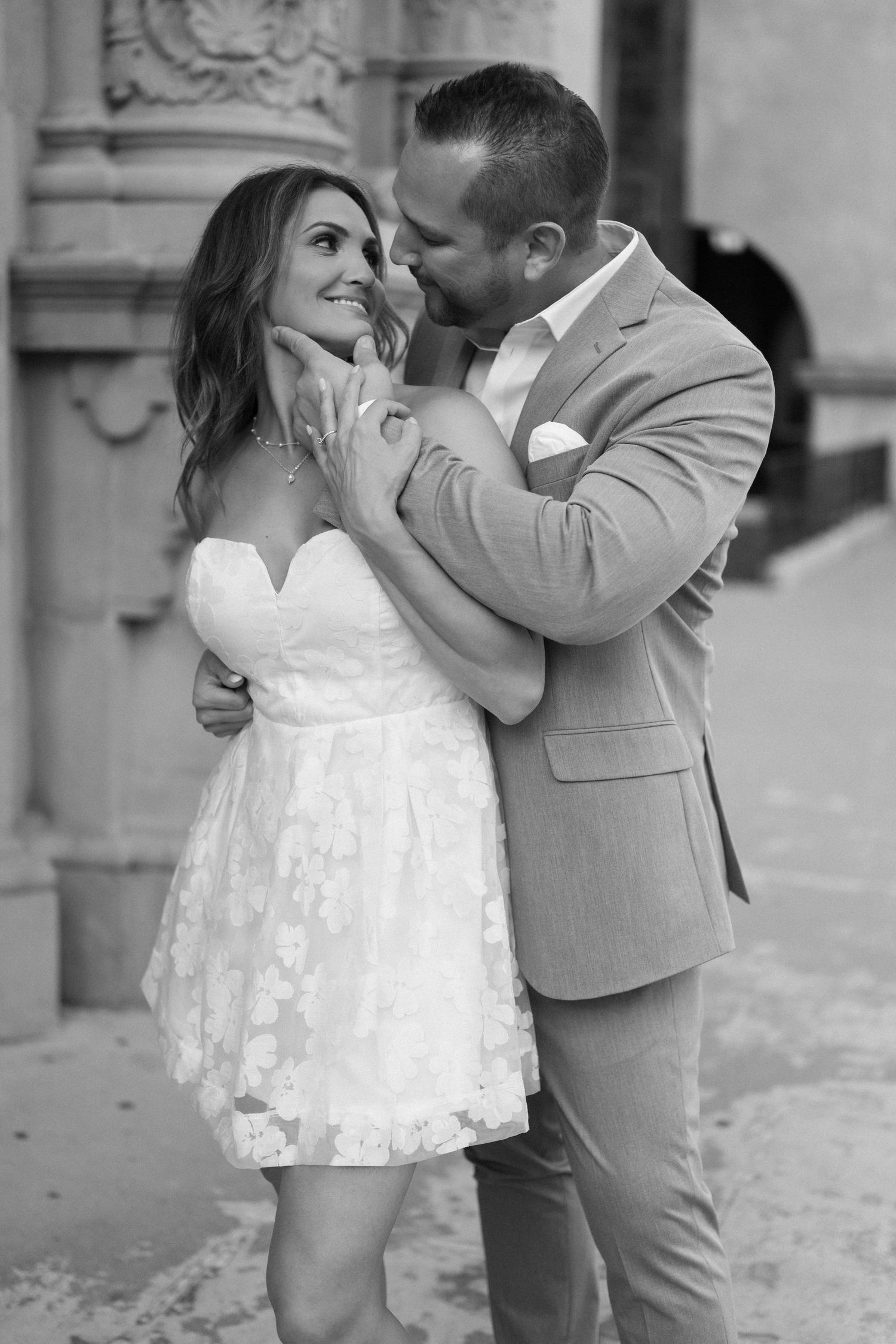 A romantic wedding couple shares a sweet dance together in a series of black and white photos.