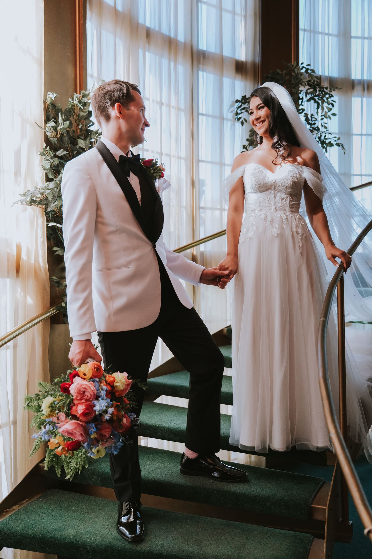A series of three wedding photos showing a couple in formal attire dancing and embracing near sunlit windows.