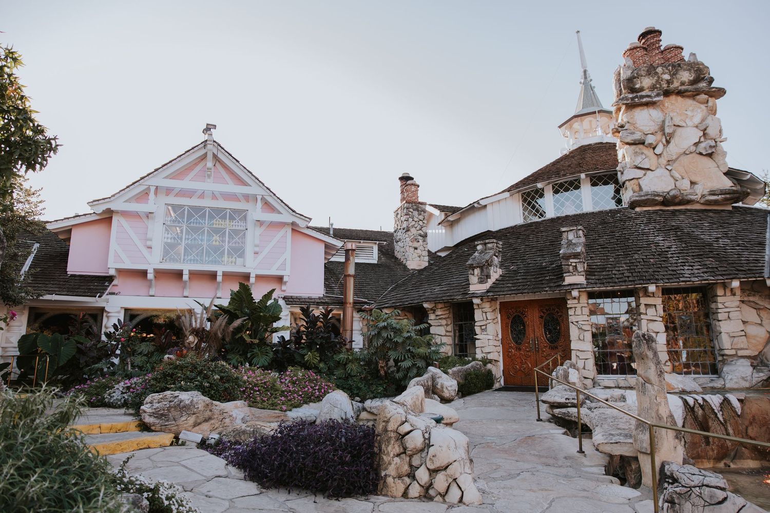 Rustic stone buildings and architectural details of a wedding venue exterior shown in a photo collage.