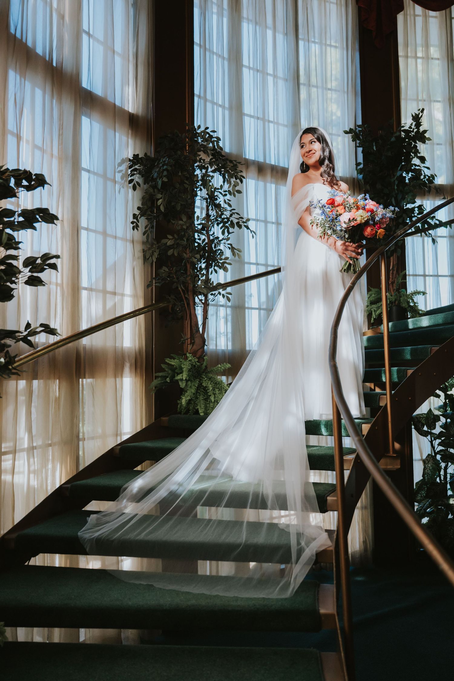 A series of romantic bridal portraits with flowing white dress and veil against sheer curtained windows.