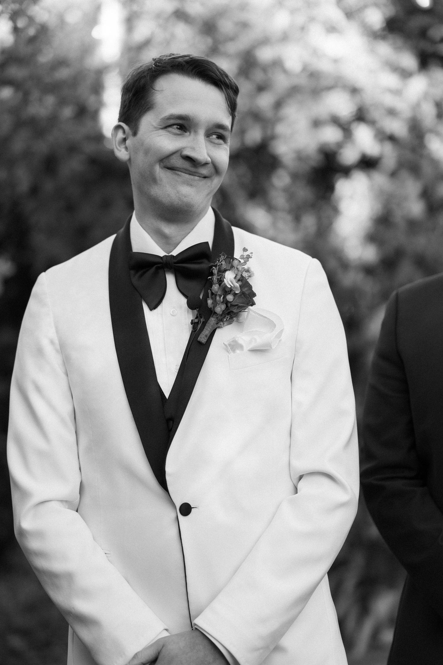 A series of wedding party portraits showing someone in a white tuxedo jacket and black bow tie.