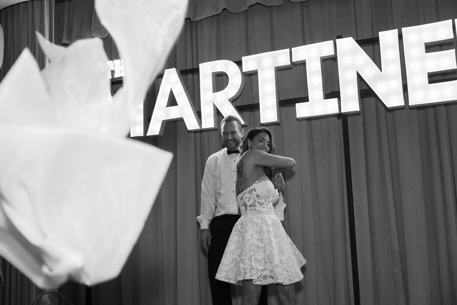 Wedding celebration signage and decorative elements at Martinelli's venue.