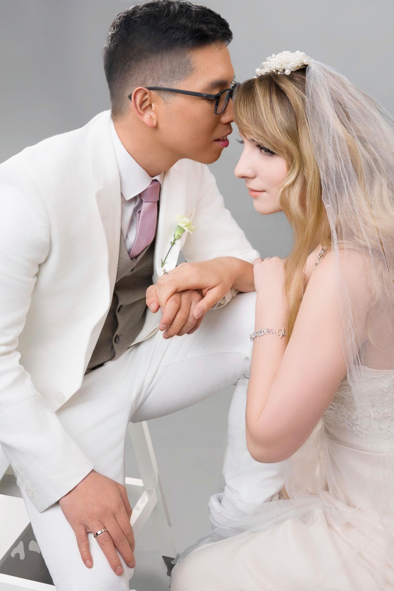 Pre- wedding portrait of international couple. Captured in cozy, romantic, and in love. capture in while they were whispering