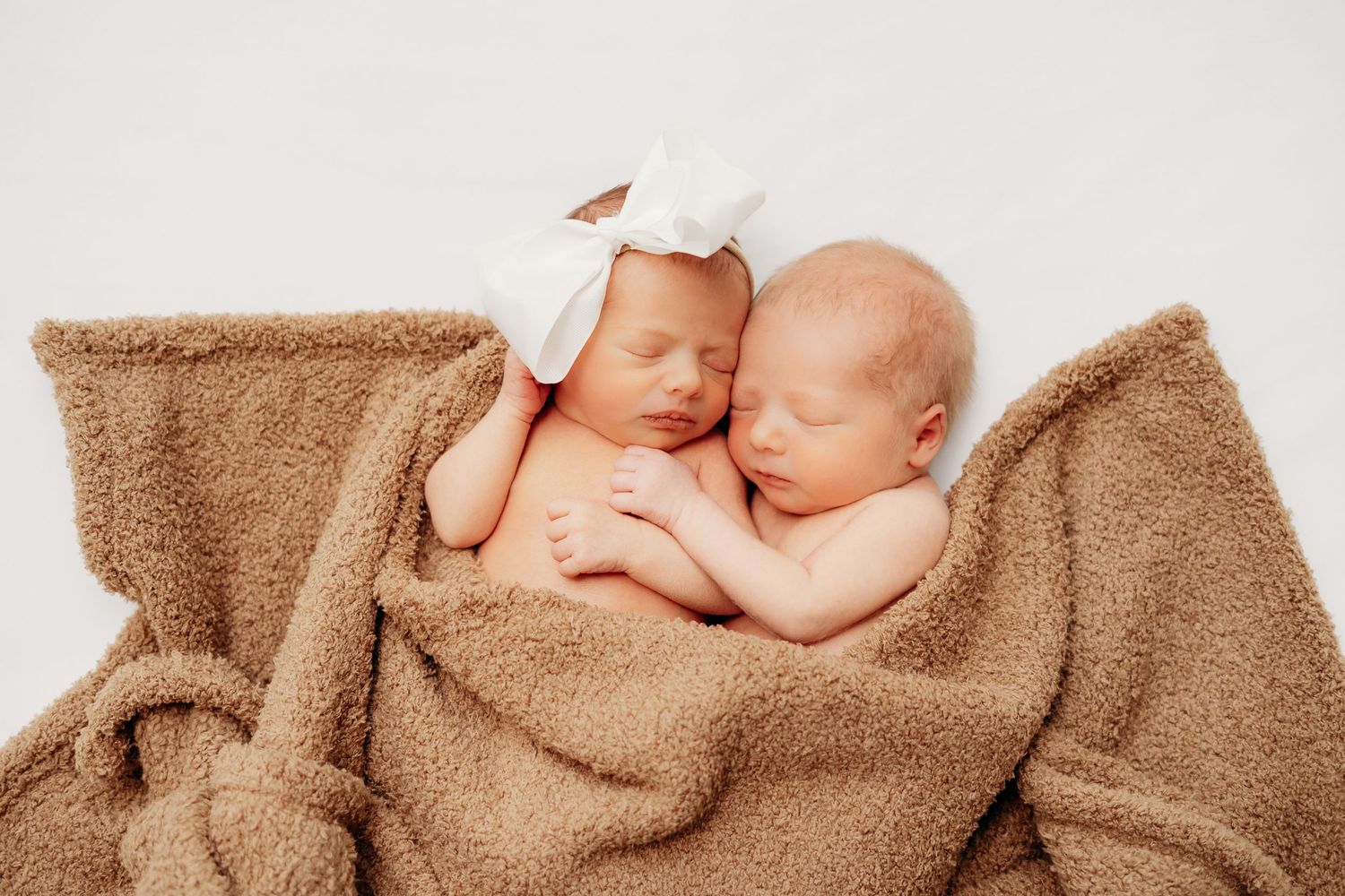 Twin newborn photography, newborn twins posed photography, newborn twins laying together. Denver newborn photographer.