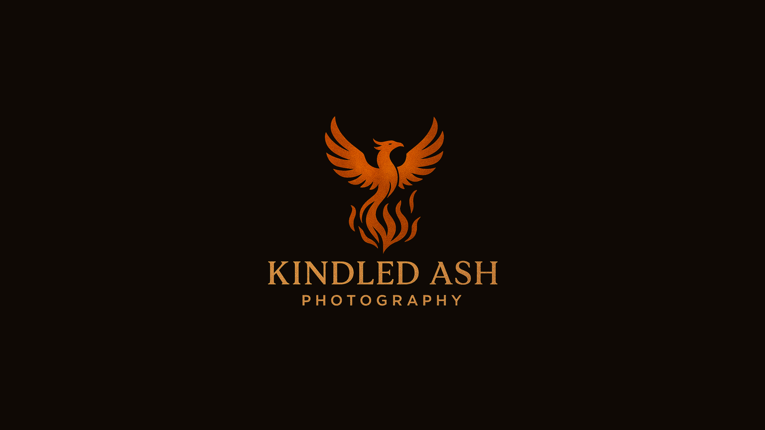 Orange phoenix logo design for Kindled Ash Photography on dark background.