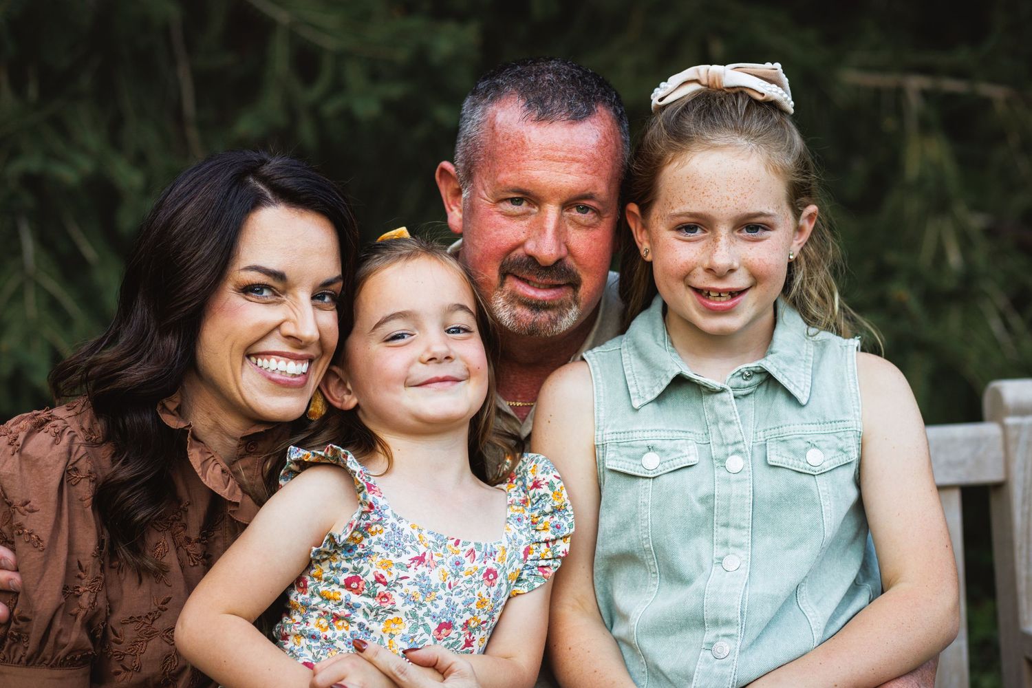 A family shares joyful moments together outdoors in a series of candid photographs.