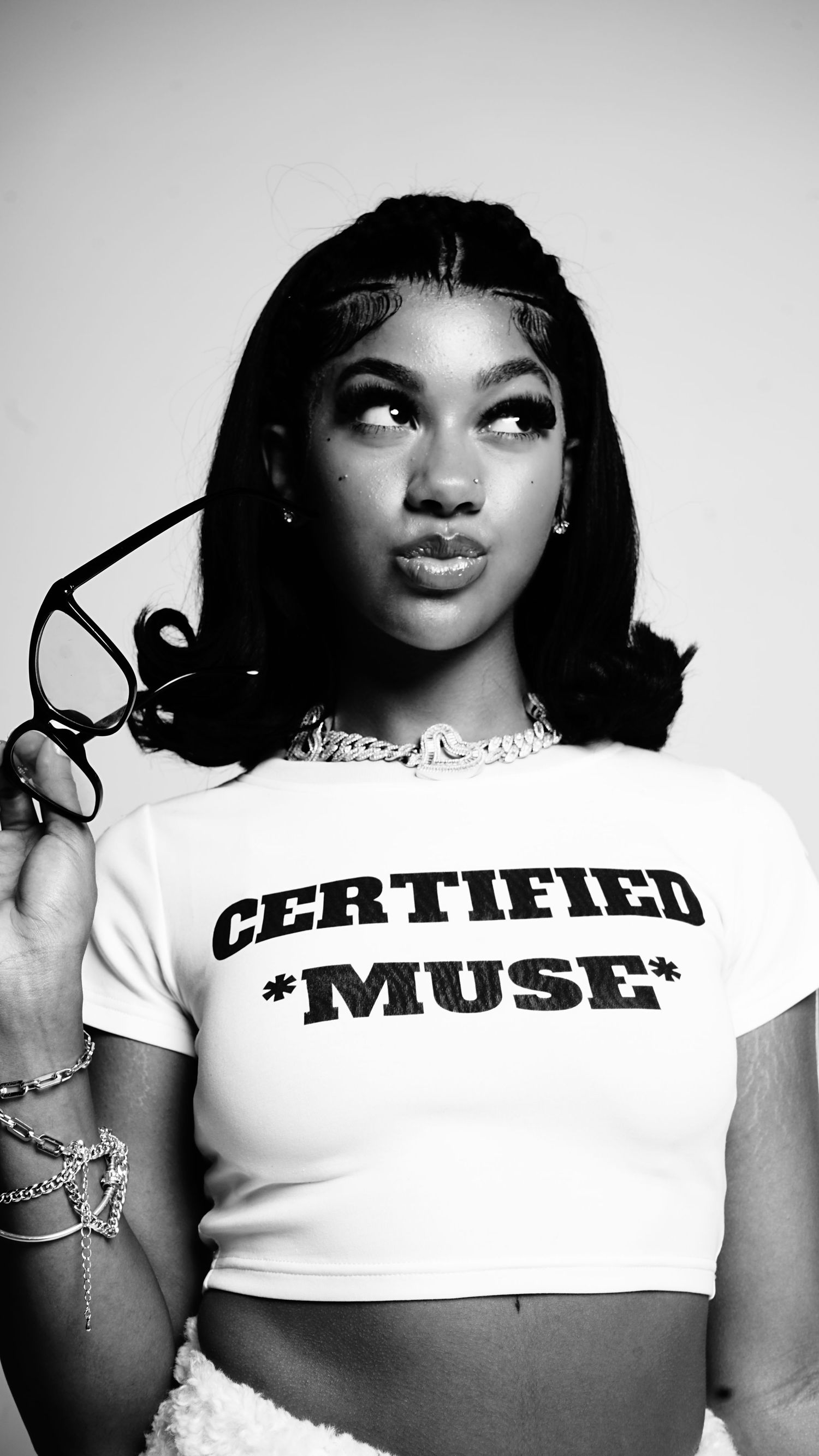 Monochrome portrait series showing a white crop top with 'CERTIFIED MUSE' text.