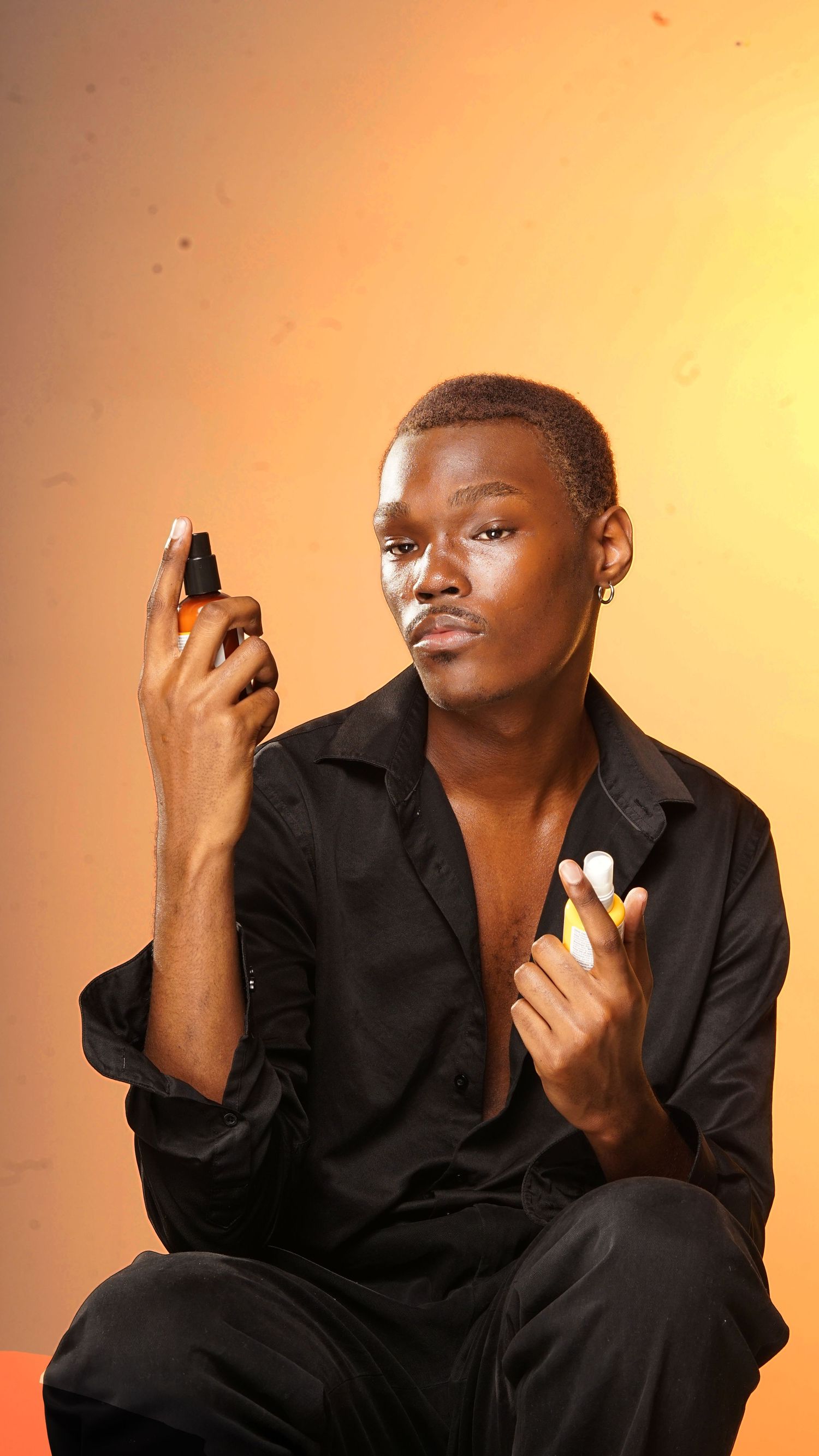 Expressive portrait sequence showing hand gestures against warm orange background.