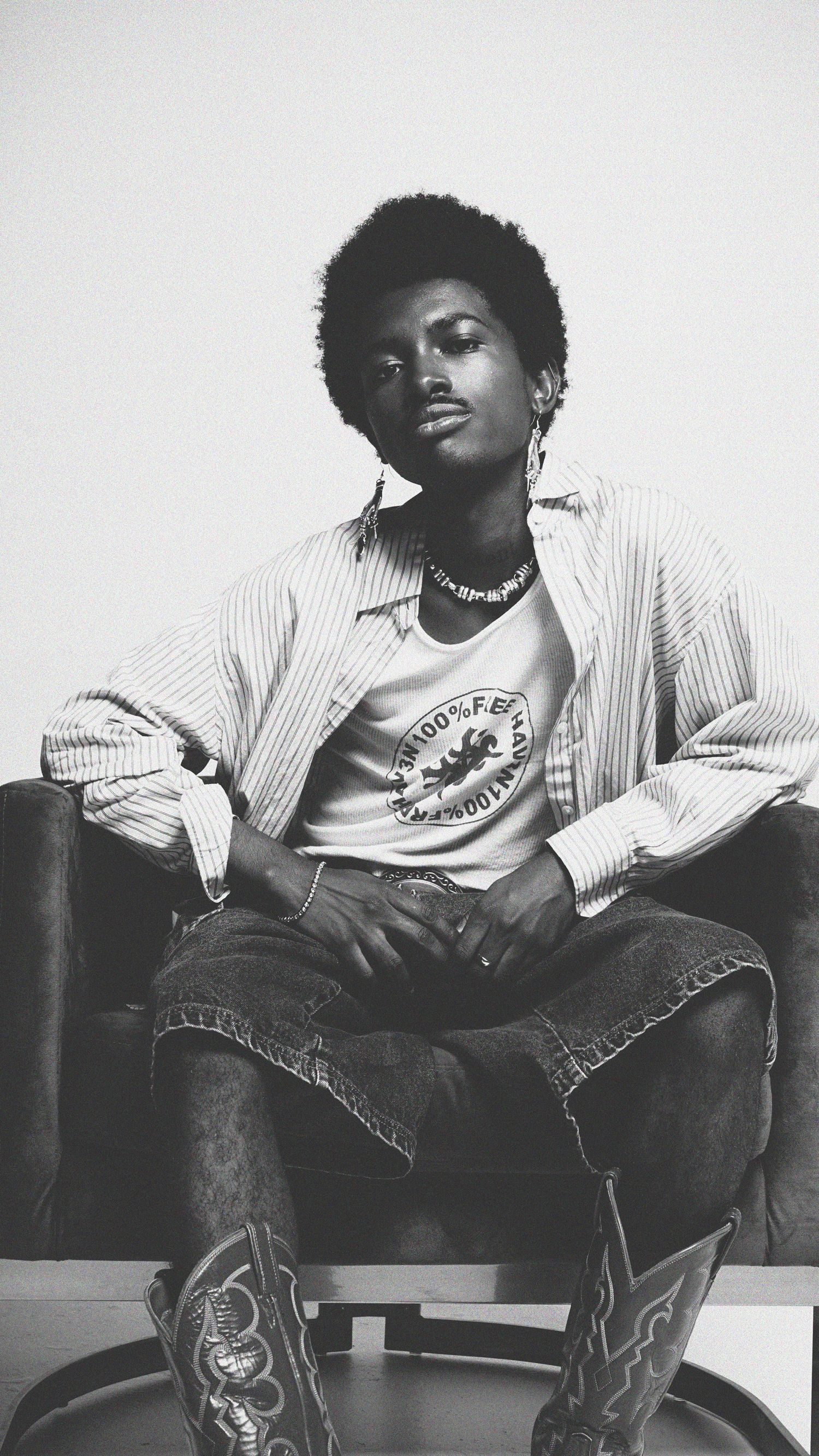 Black and white portraits of someone in casual denim and striped shirt lounging in a chair.