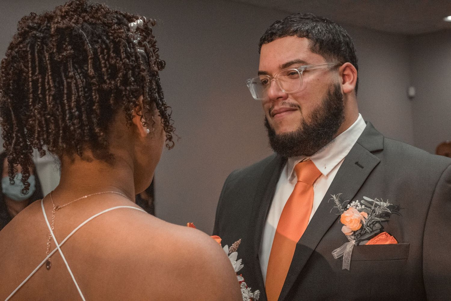 A couple shares an intimate moment during their wedding ceremony.
