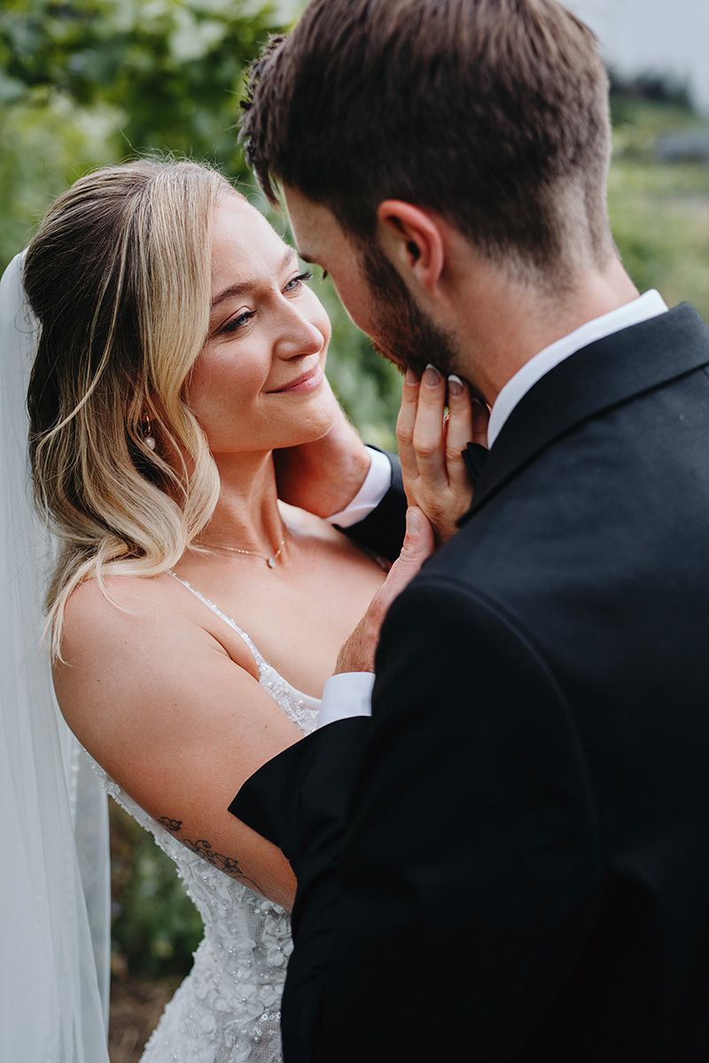 A romantic series of wedding photos showing a couple embracing and sharing intimate moments together outdoors.