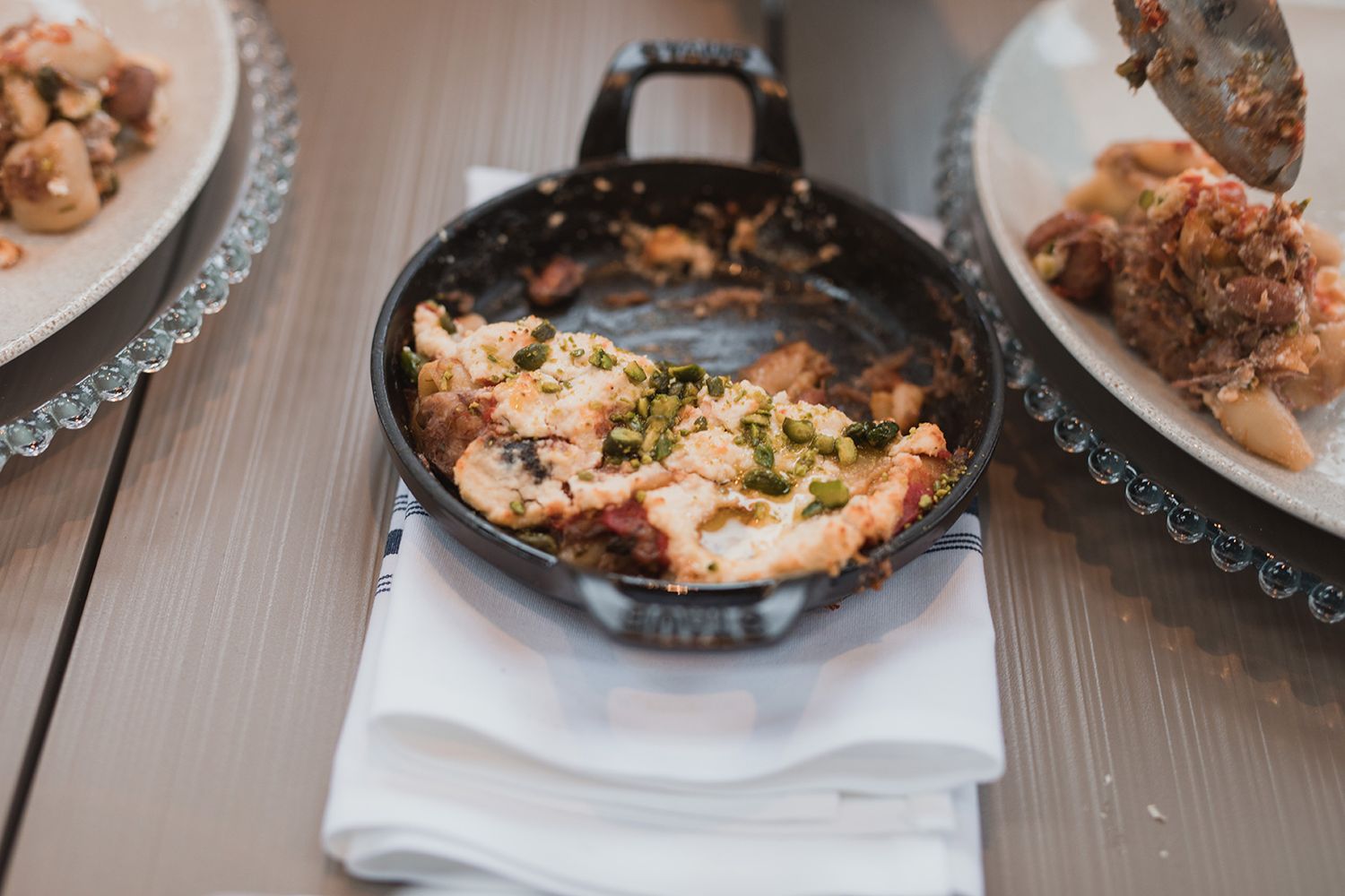 Family-style dinner served during wedding reception at Cedar creek Winery.