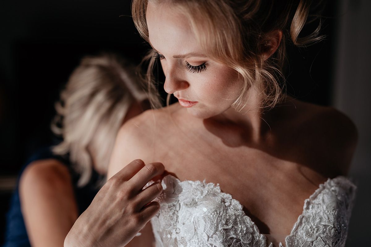 A romantic wedding photography series showing intimate moments between a bride and groom in black and white tones.