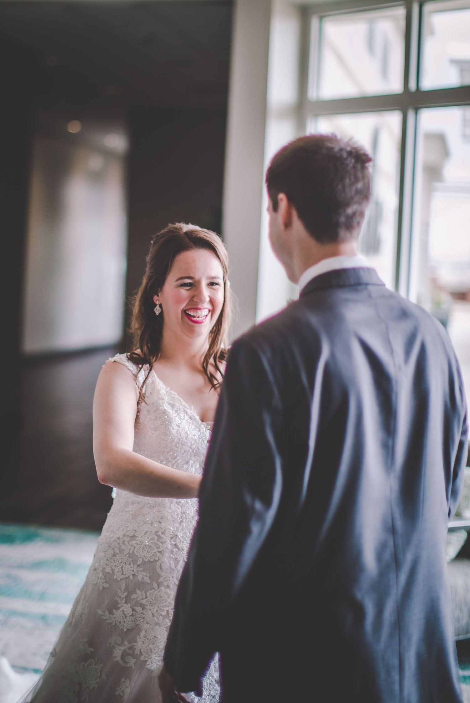 A series of candid wedding moments showing natural reactions during a first look.