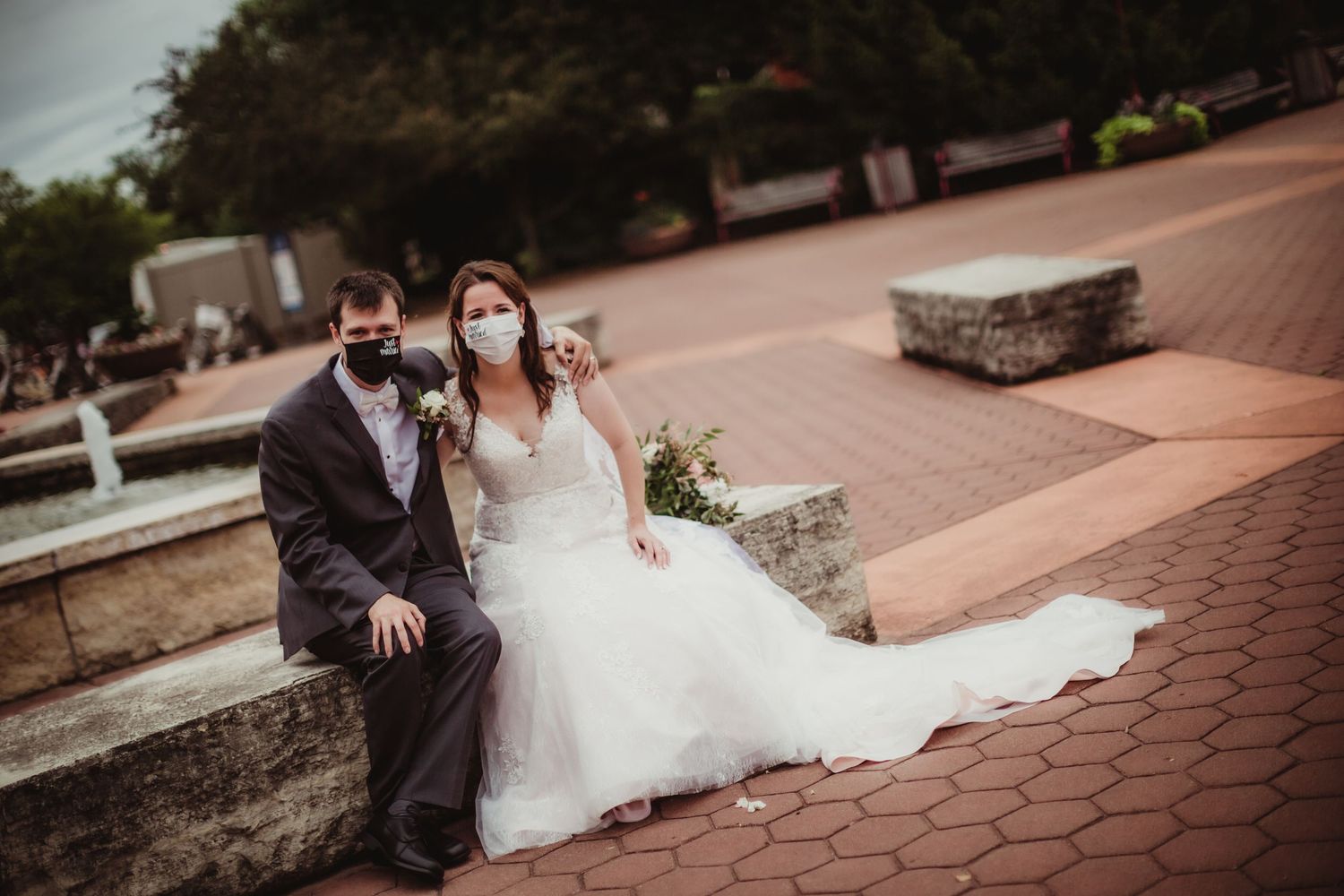 Wedding photography sequence captures romantic moments on brick paved pathway.