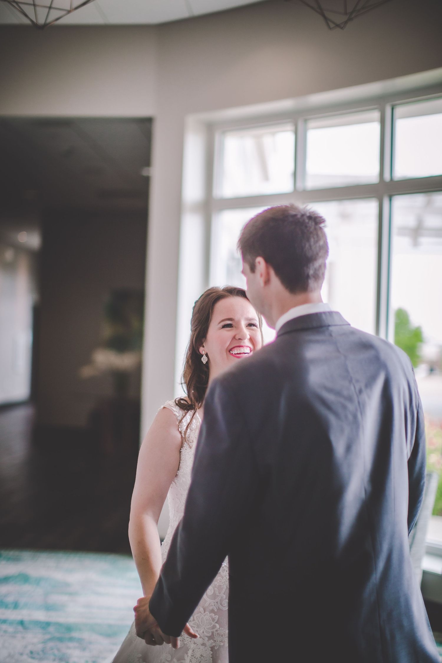 Intimate wedding first look sequence showing genuine joy and connection.