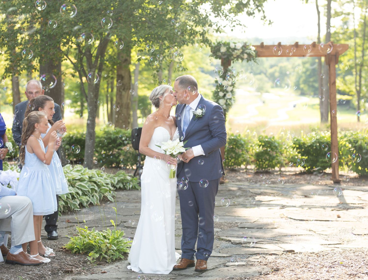 Outdoor Wedding photography at a summer wedding at the Tanglewood Club in Chagrin Falls, Ohio by Sarah Marie Studio.
