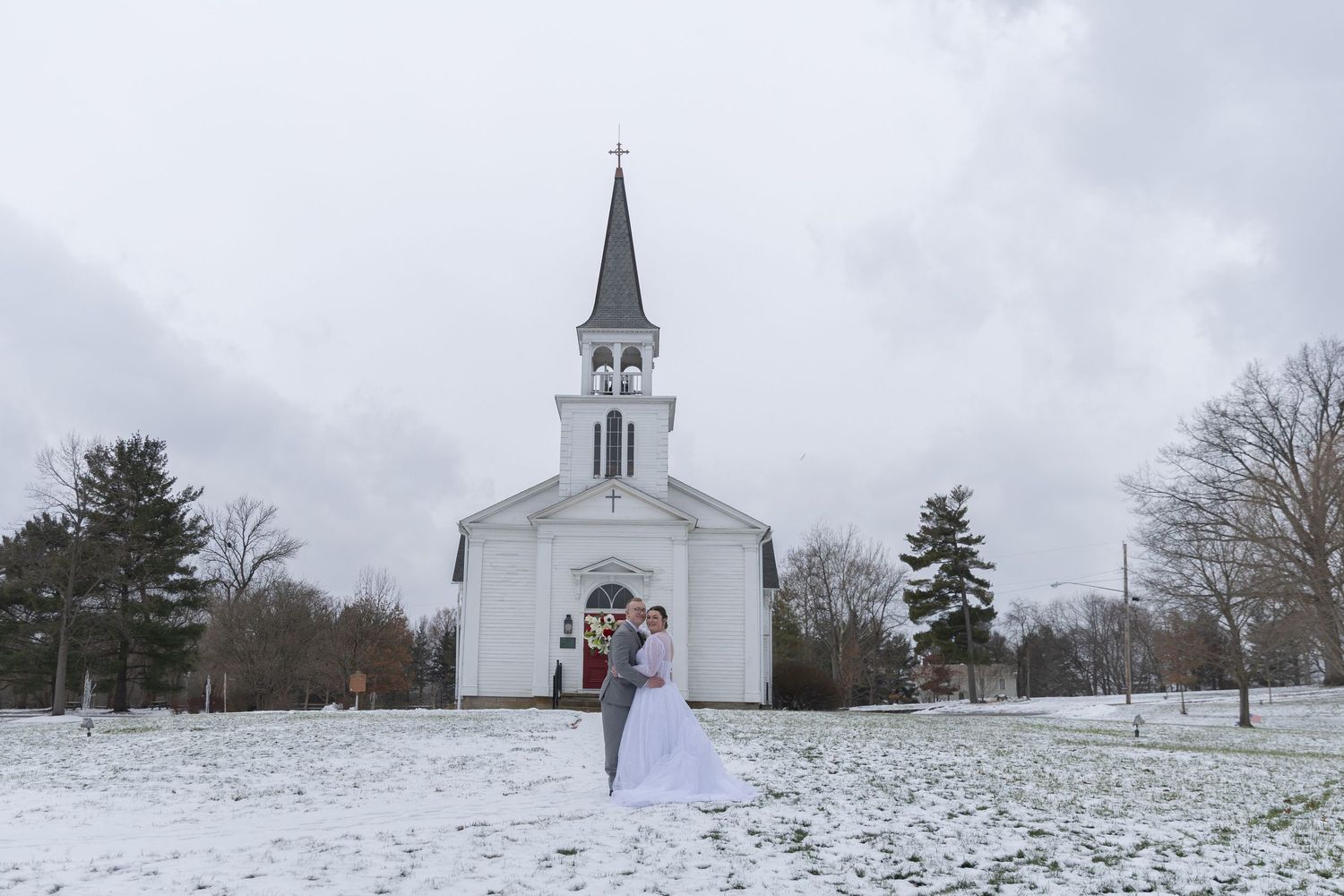 Indoor wedding ceremony at St. James Meeting House in Boardman, Ohio captured by Sarah Marie Studio