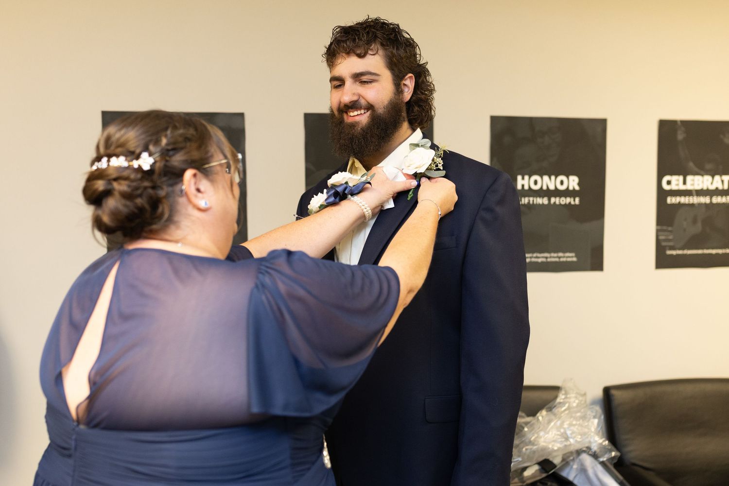 Candid moments between wedding party members during preparation time.