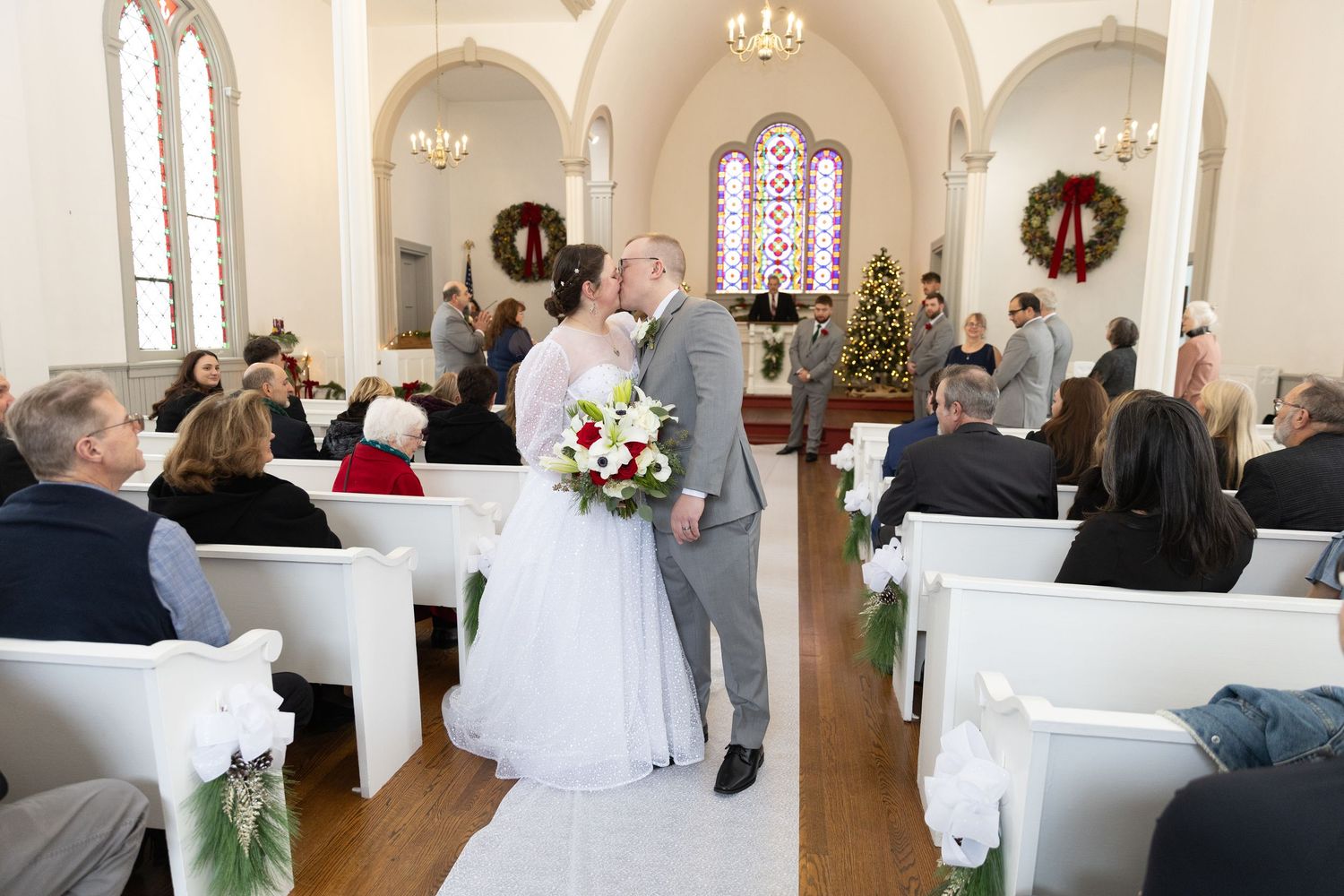 Indoor wedding ceremony at St. James Meeting House in Boardman, Ohio captured by Sarah Marie Studio