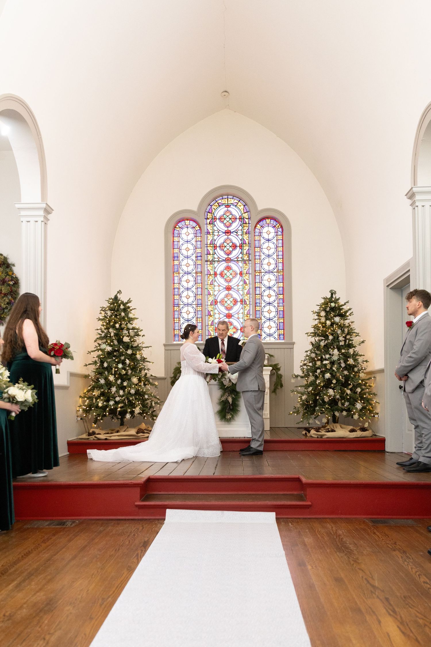 Indoor wedding ceremony at St. James Meeting House in Boardman, Ohio captured by Sarah Marie Studio