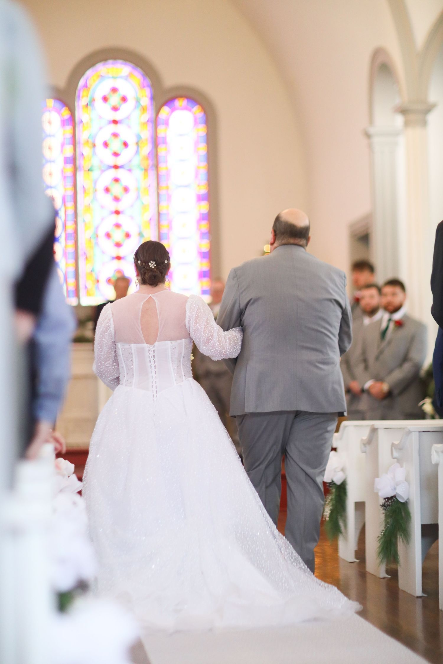 Indoor wedding ceremony at St. James Meeting House in Boardman, Ohio captured by Sarah Marie Studio